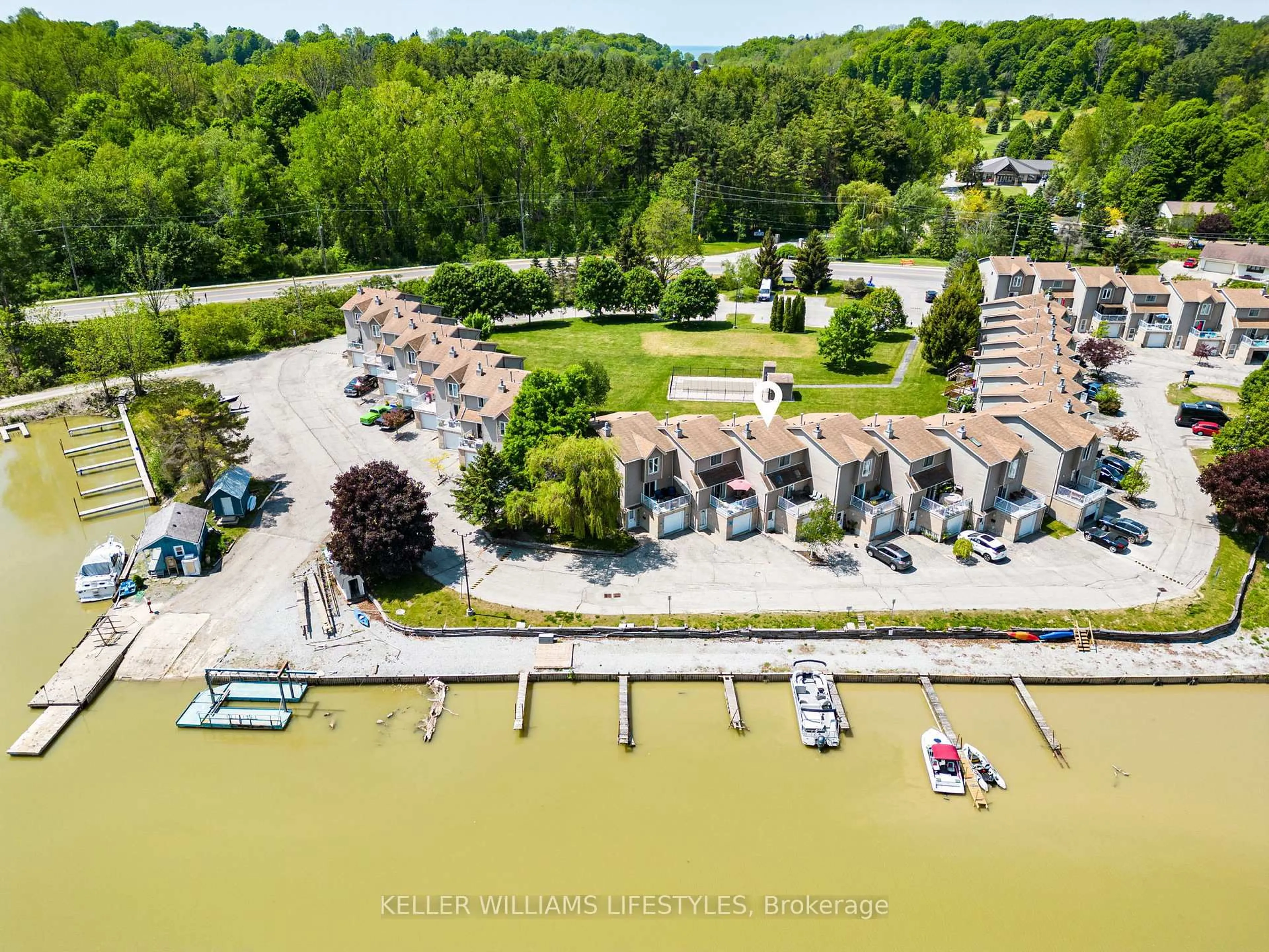 A pic from outside/outdoor area/front of a property/back of a property/a pic from drone, water/lake/river/ocean view for 301 Carlow Rd #41, Central Elgin Ontario N5L 1B8