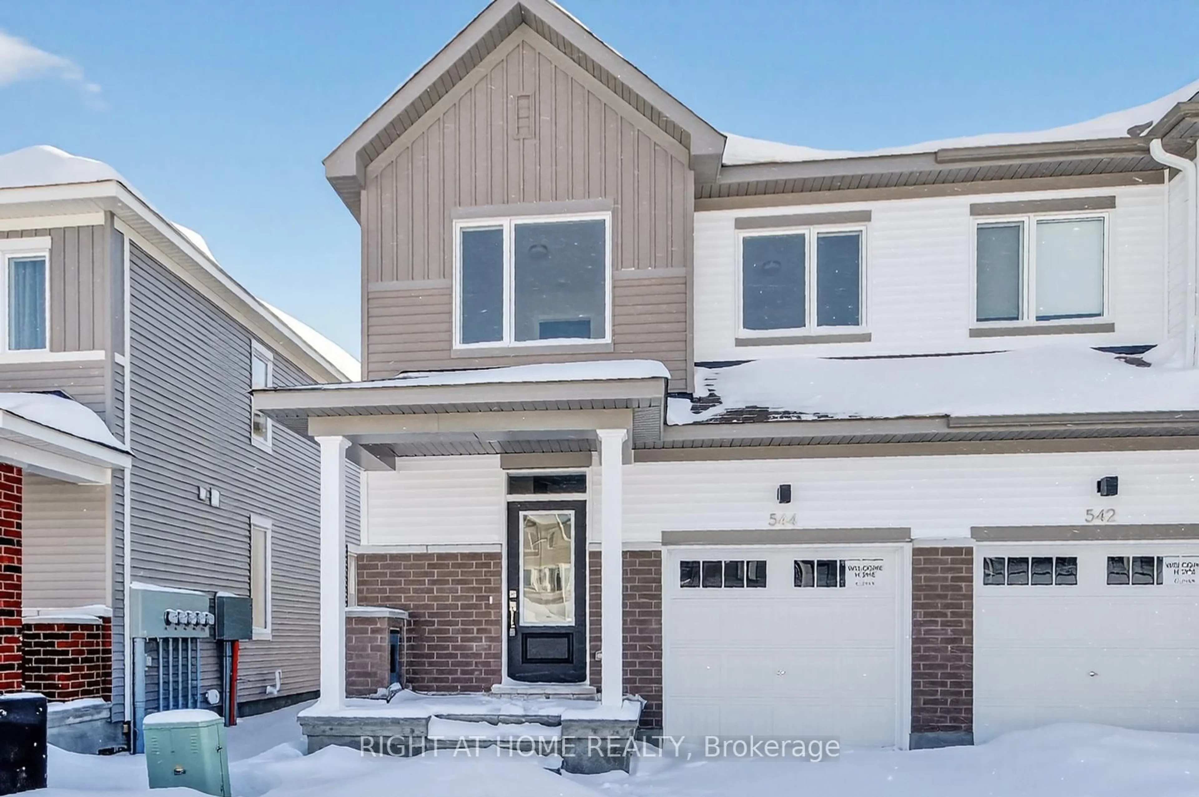 Home with brick exterior material, street for 544 Promontory Pl, Barrhaven Ontario K2J 7H2