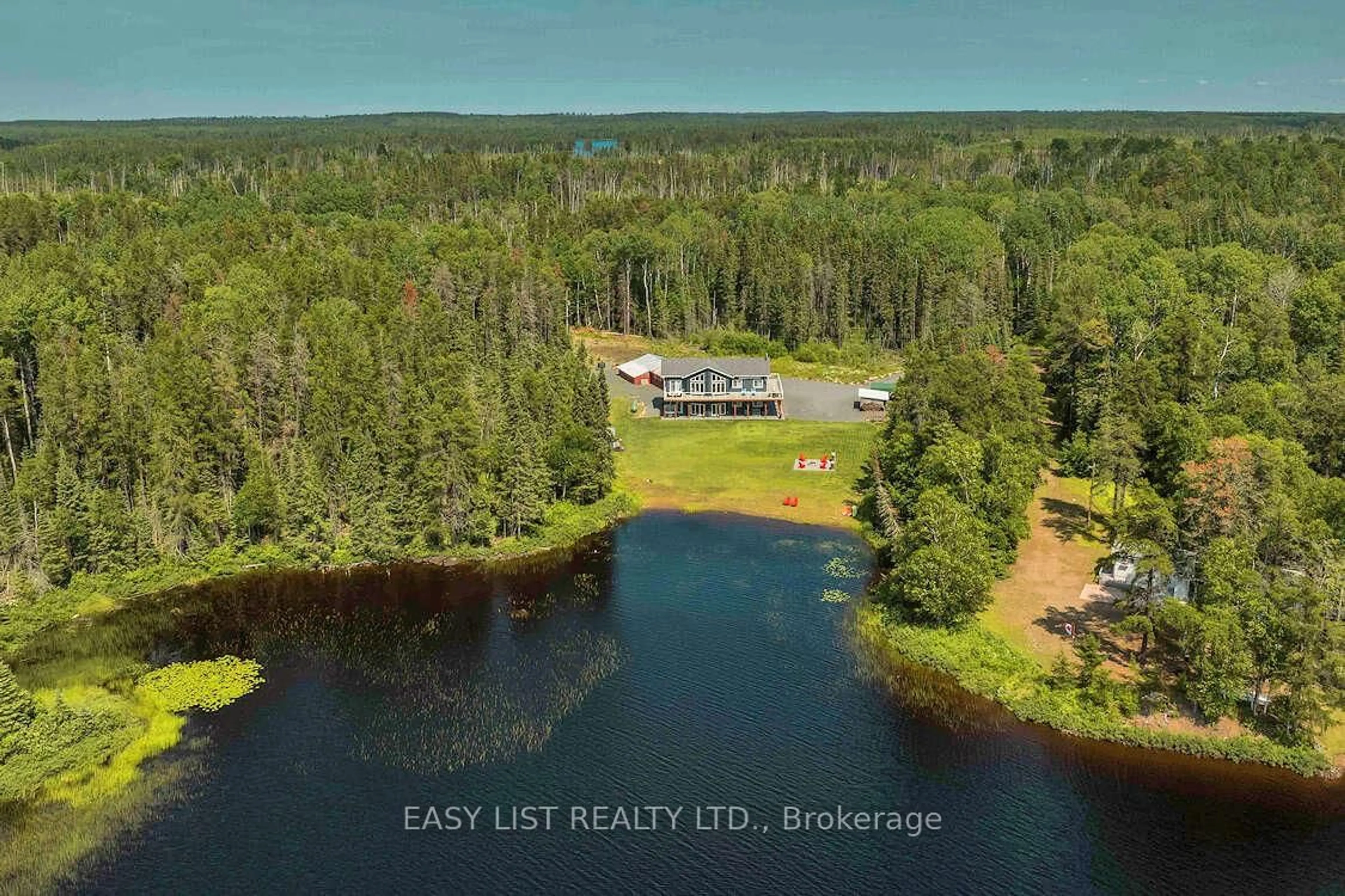 A pic from outside/outdoor area/front of a property/back of a property/a pic from drone, water/lake/river/ocean view for 16 McLeish Lake, Thunder Bay Ontario P7A 8E4
