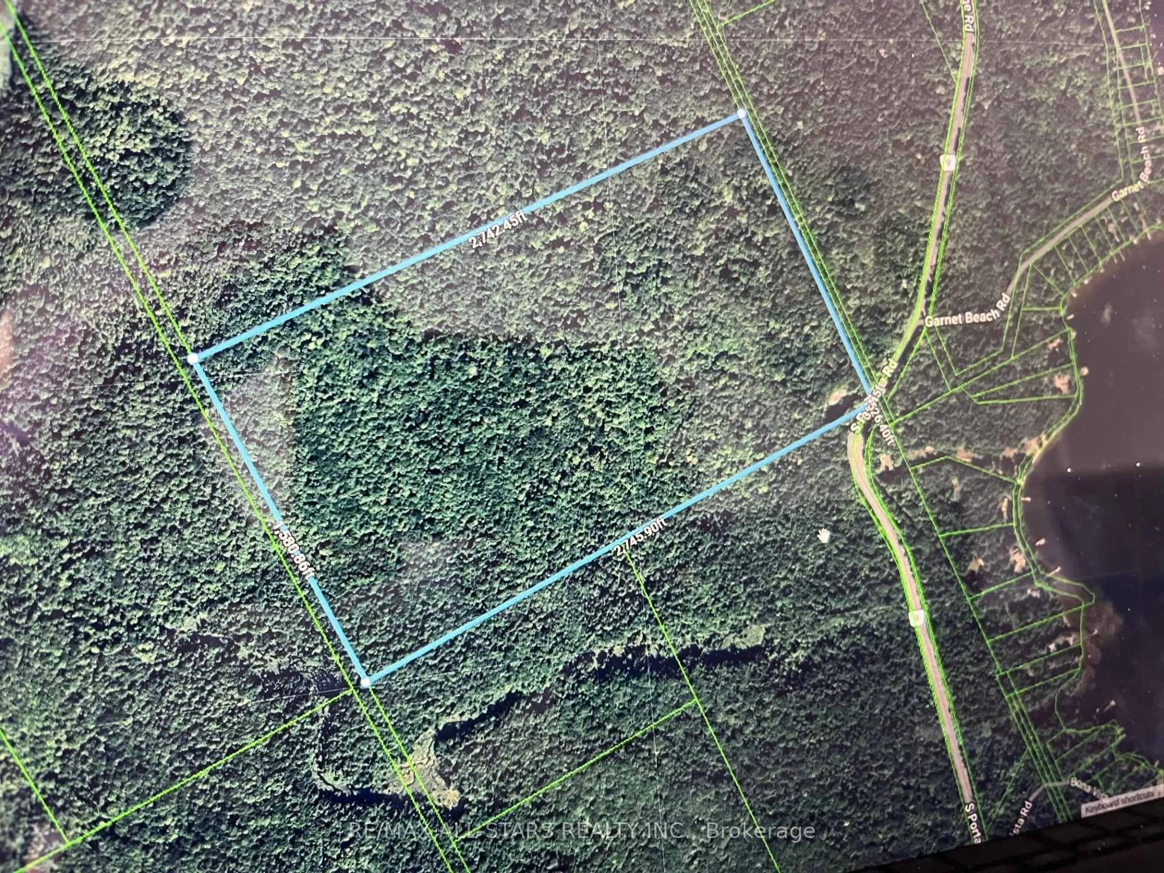 A pic from outside/outdoor area/front of a property/back of a property/a pic from drone, forest/trees view for 2406 South Portage Rd, Huntsville Ontario P1H 2J3