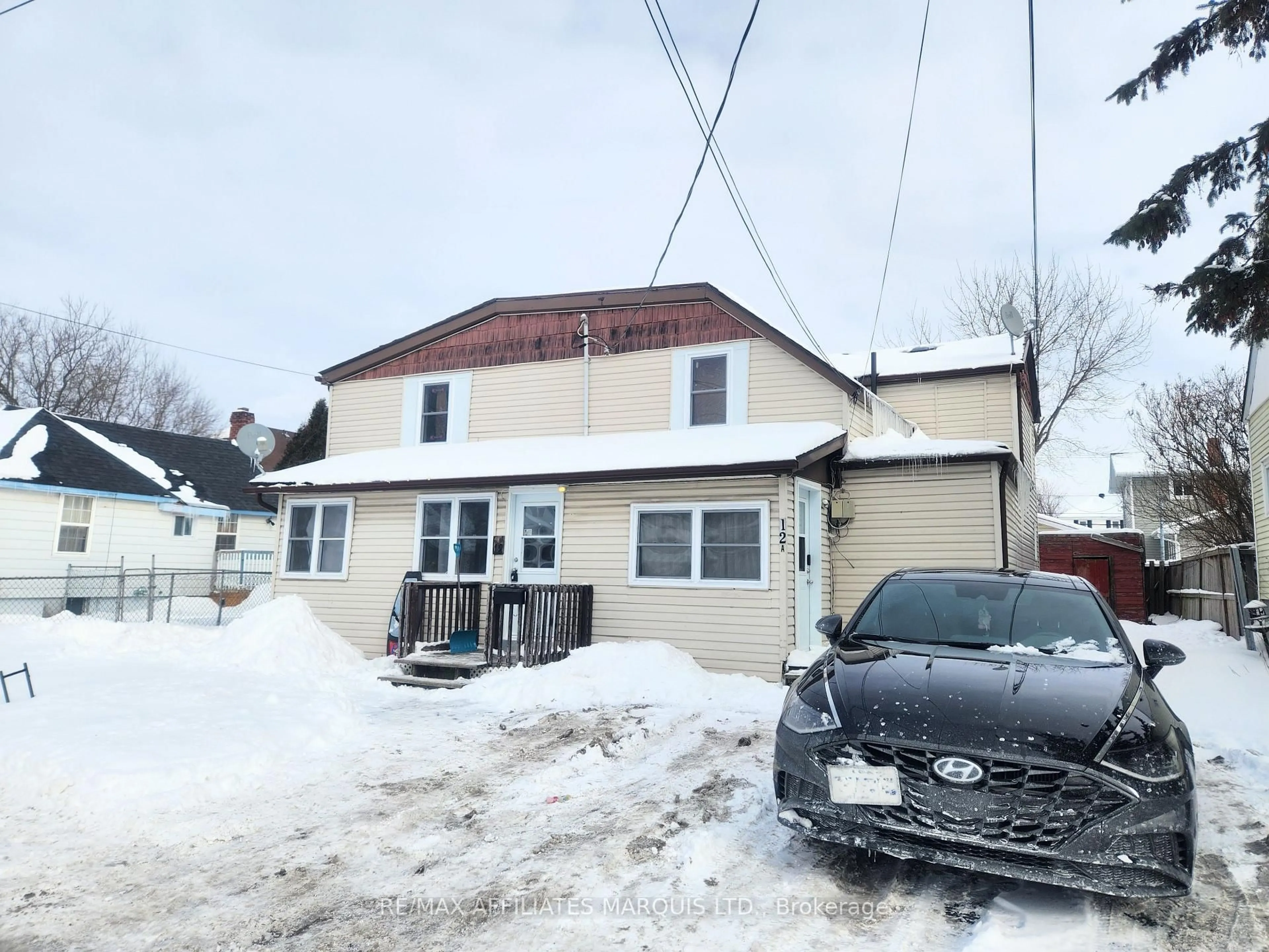 A pic from outside/outdoor area/front of a property/back of a property/a pic from drone, building for 12 - 12A Cartier Ave, Cornwall Ontario K6J 4B4