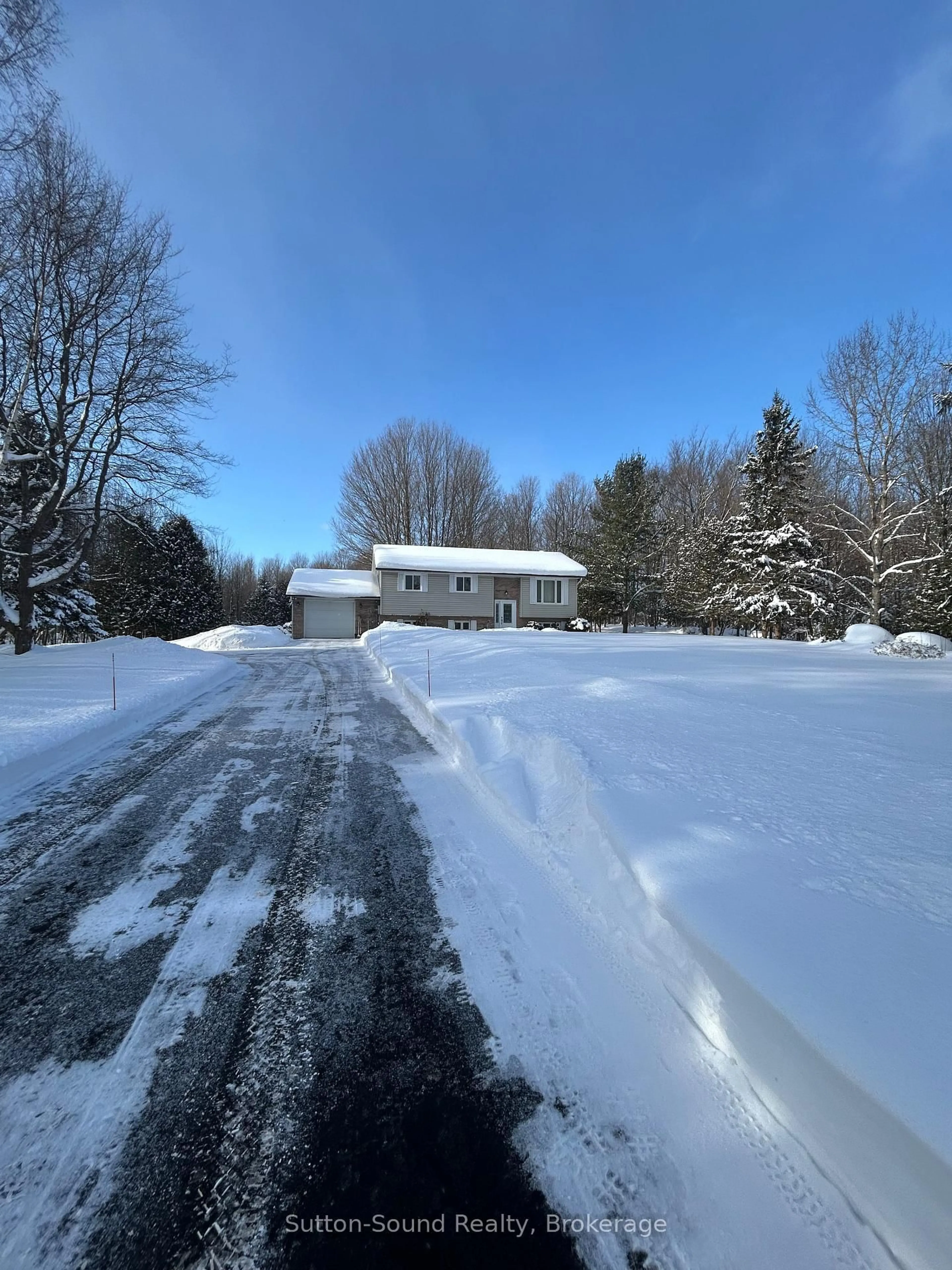 A pic from outside/outdoor area/front of a property/back of a property/a pic from drone, street for 240135 Wilcox Sdrd, Georgian Bluffs Ontario N4K 5N7