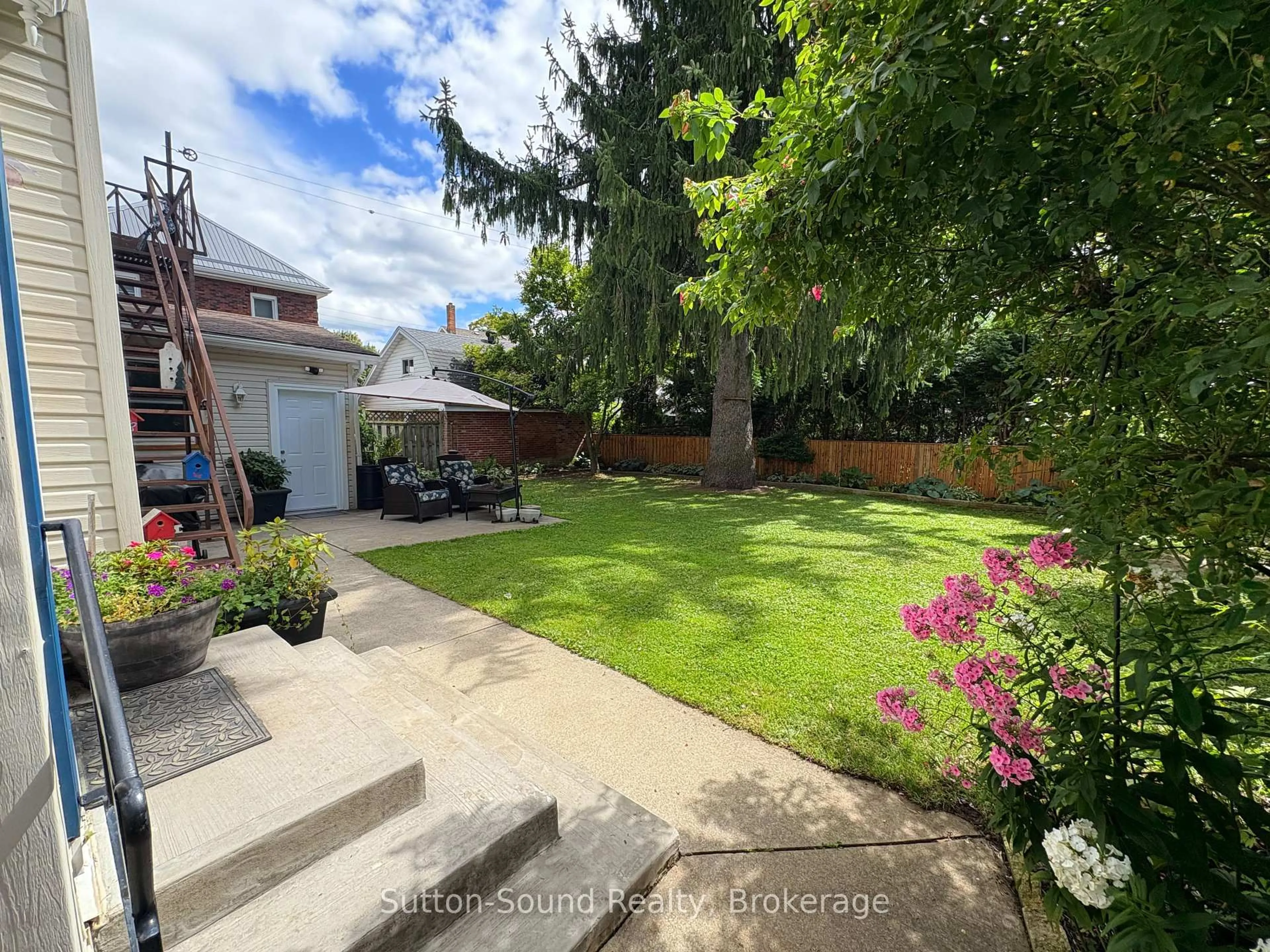 A pic from outside/outdoor area/front of a property/back of a property/a pic from drone, street for 155 5th  A St, Owen Sound Ontario N4K 1C4