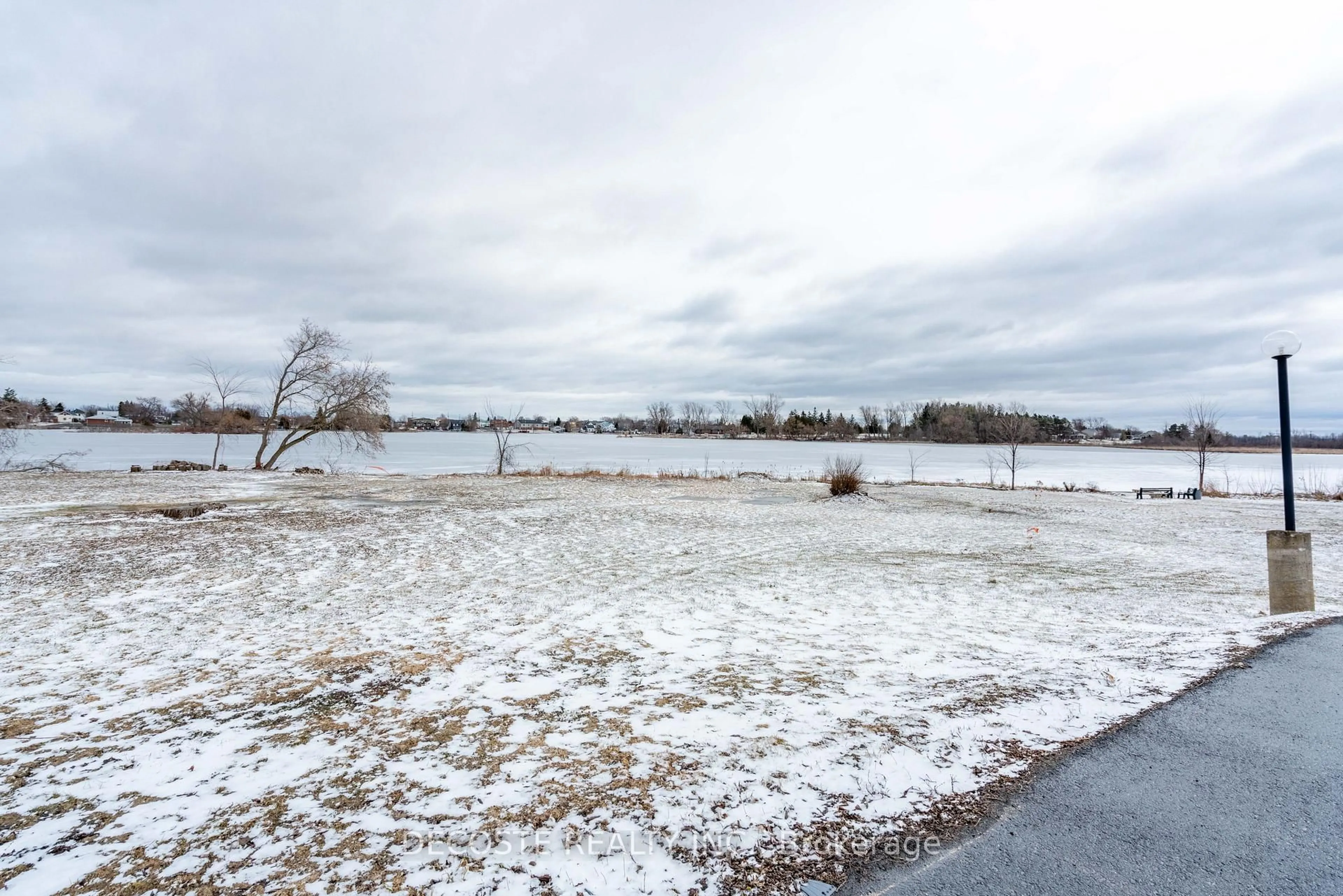 A pic from outside/outdoor area/front of a property/back of a property/a pic from drone, water/lake/river/ocean view for 220 Kenyon St #209, North Glengarry Ontario K0C 1A0