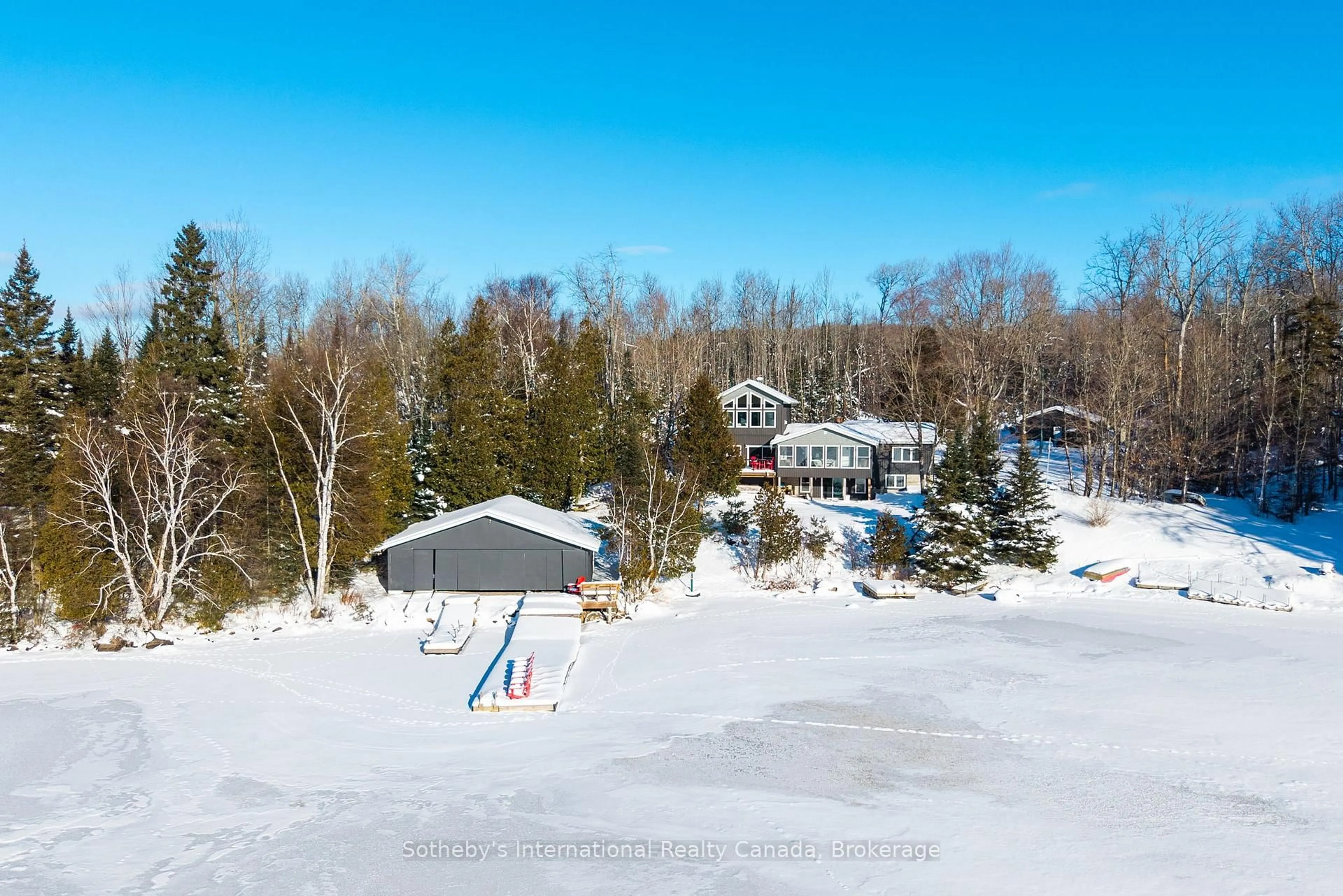 A pic from outside/outdoor area/front of a property/back of a property/a pic from drone, unknown for 126 CHAPMAN Dr, Magnetawan Ontario P0A 1P0