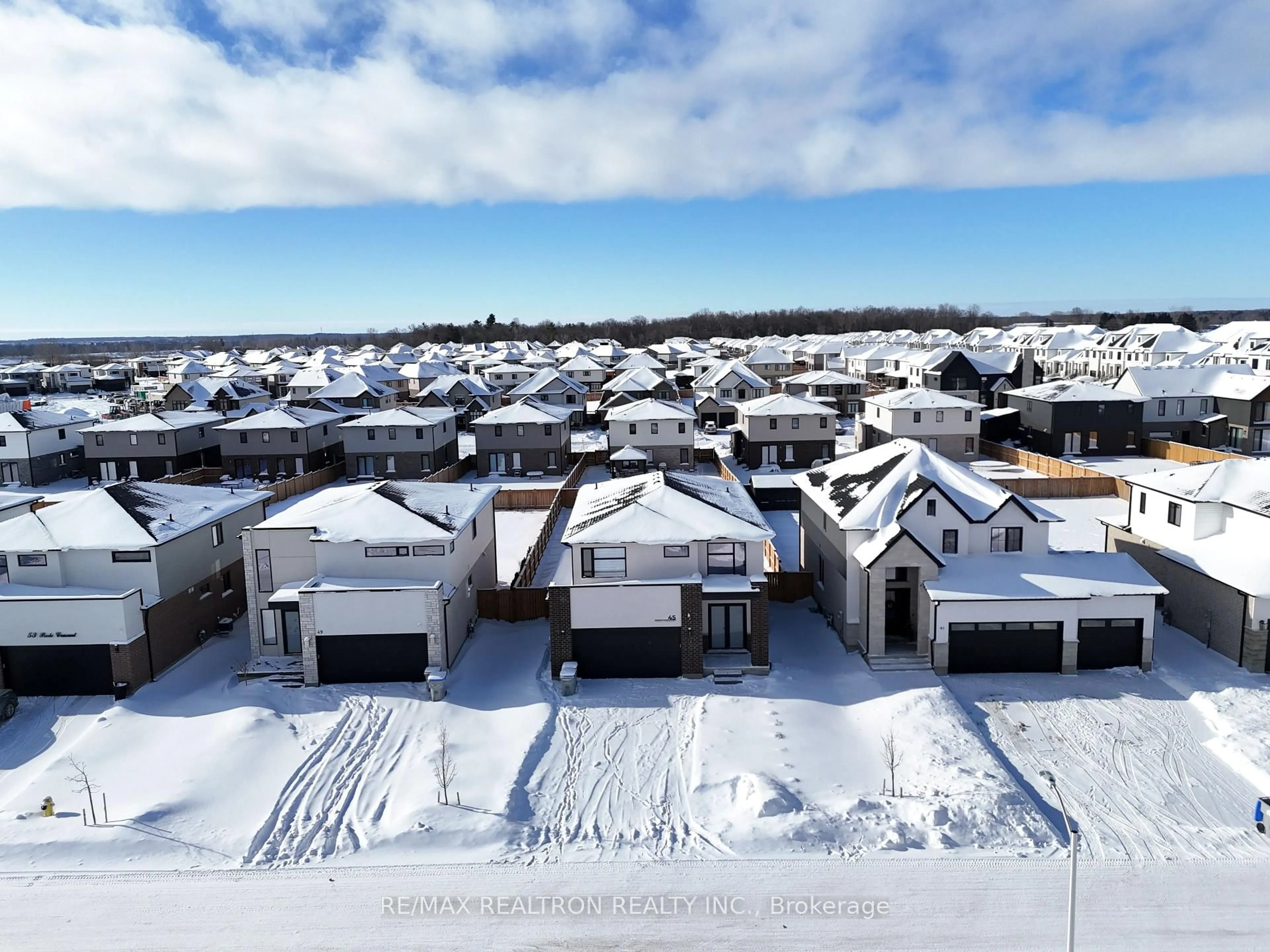 A pic from outside/outdoor area/front of a property/back of a property/a pic from drone, street for 45 Poole Cres, Middlesex Centre Ontario N0L 1R0