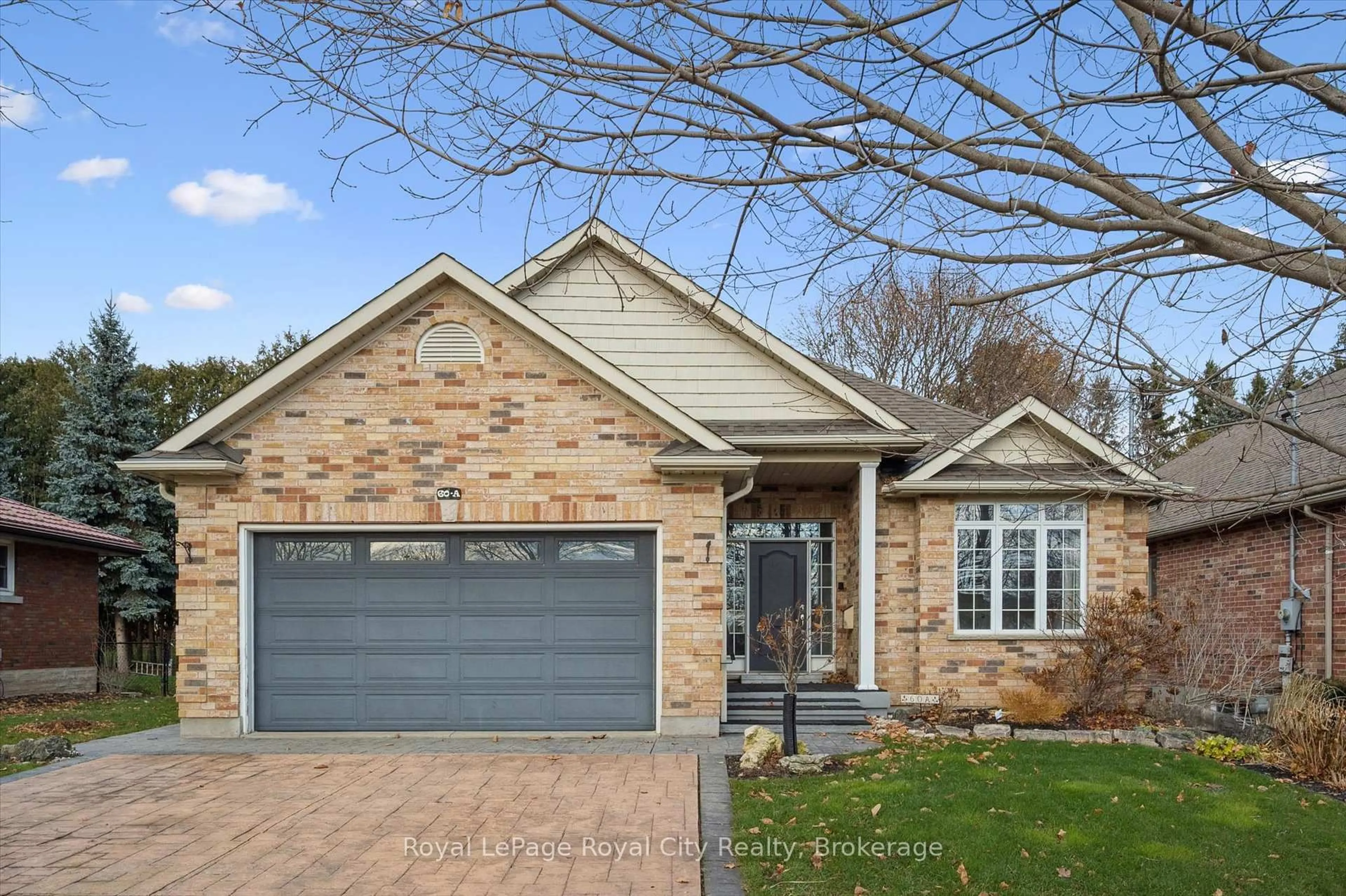 Home with brick exterior material, street for 60A Eastview Rd, Guelph Ontario N1E 1Z6
