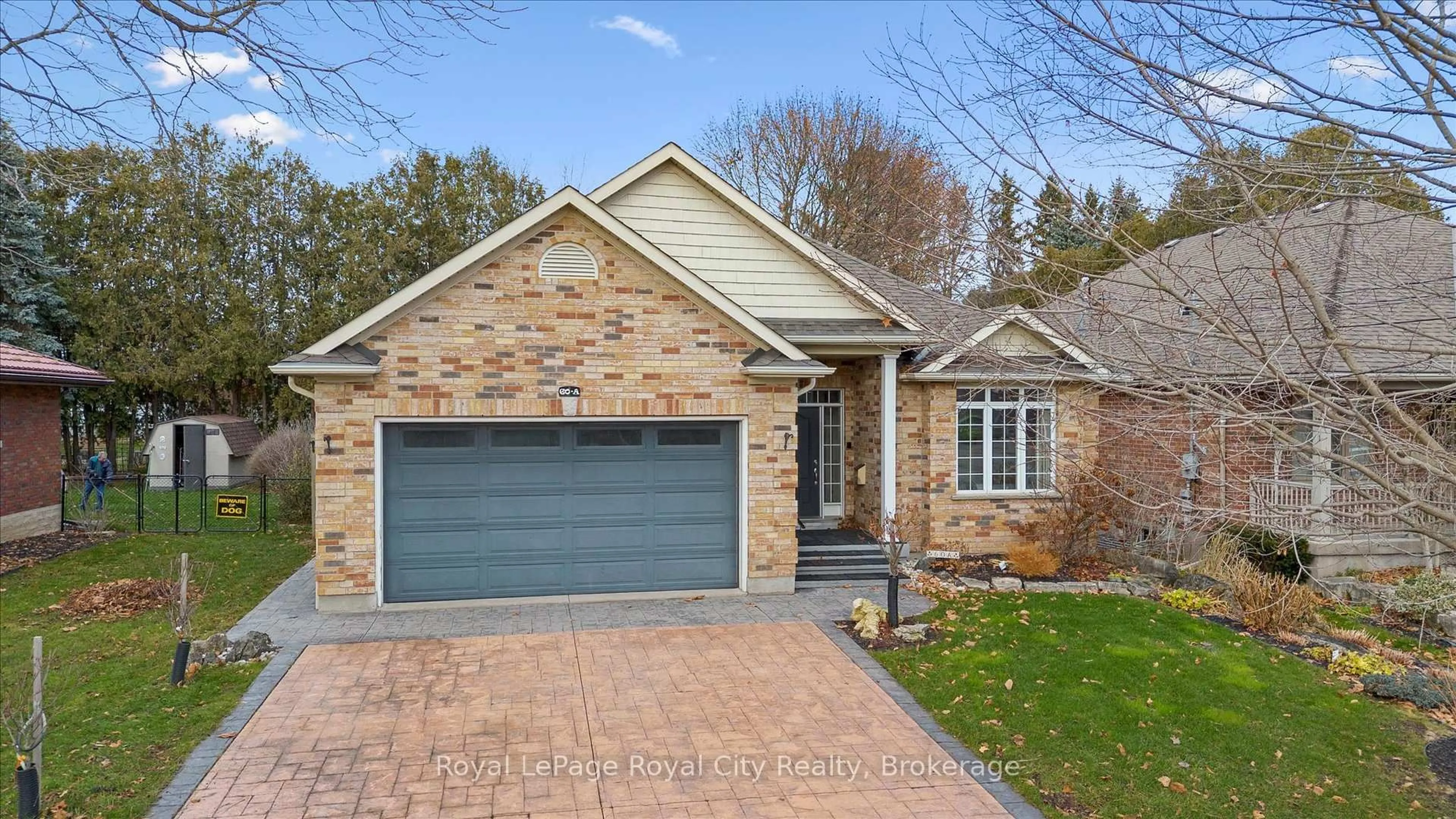 Home with brick exterior material, street for 60A Eastview Rd, Guelph Ontario N1E 1Z6