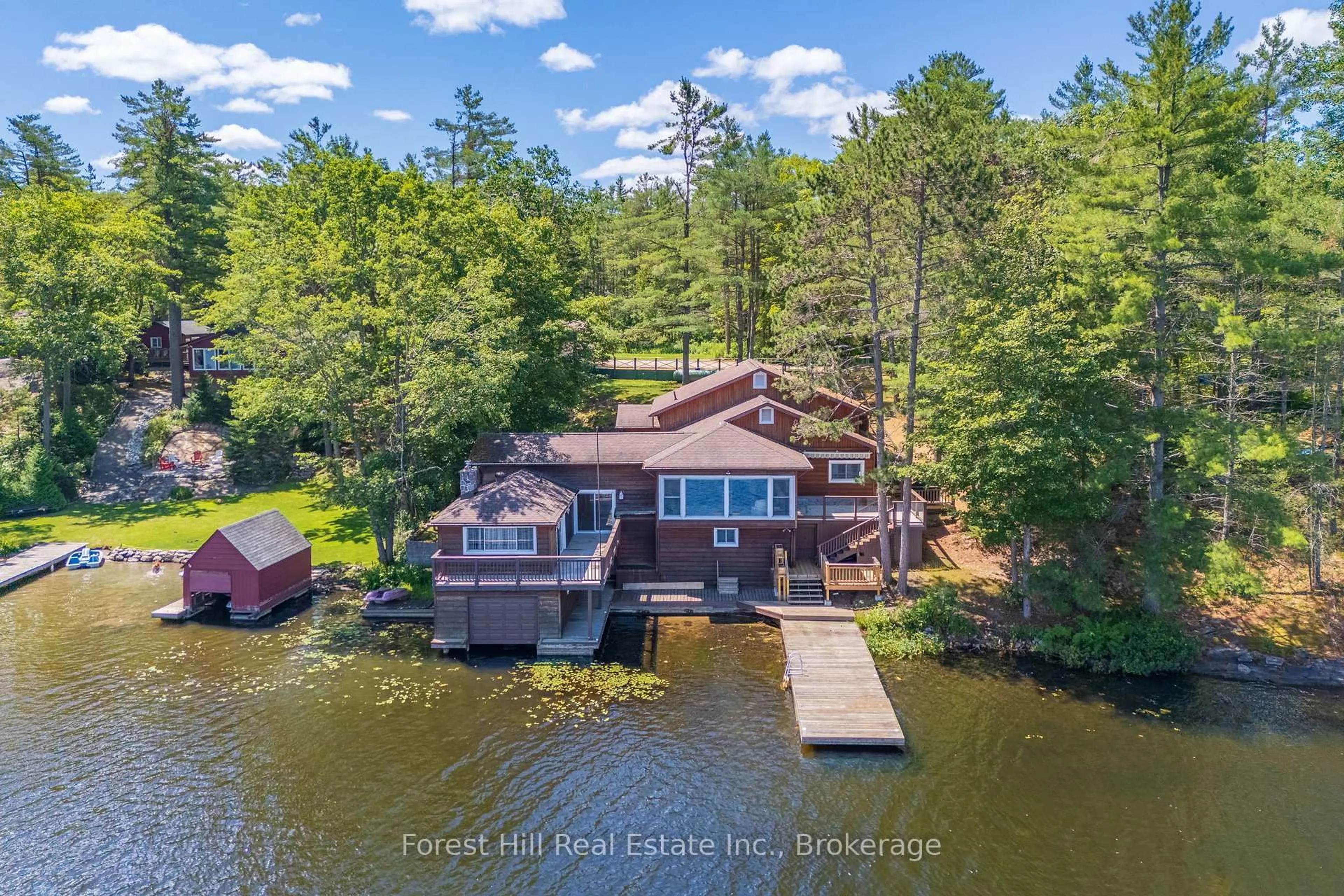 A pic from outside/outdoor area/front of a property/back of a property/a pic from drone, water/lake/river/ocean view for 1062 Pine Lake Rd, Gravenhurst Ontario P1P 1R2