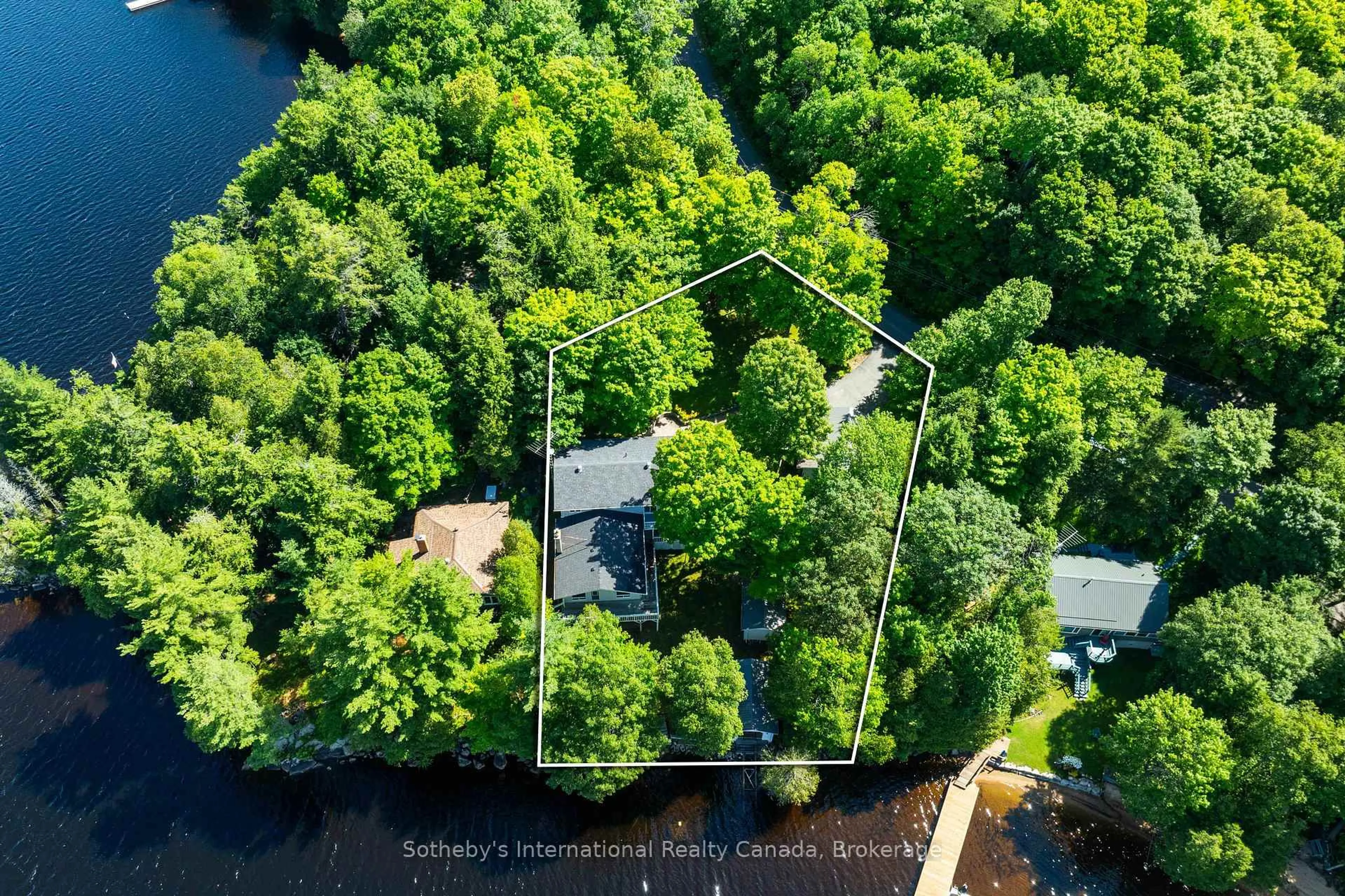 A pic from outside/outdoor area/front of a property/back of a property/a pic from drone, forest/trees view for 326 CHIKOPI Rd, Magnetawan Ontario P0A 1P0