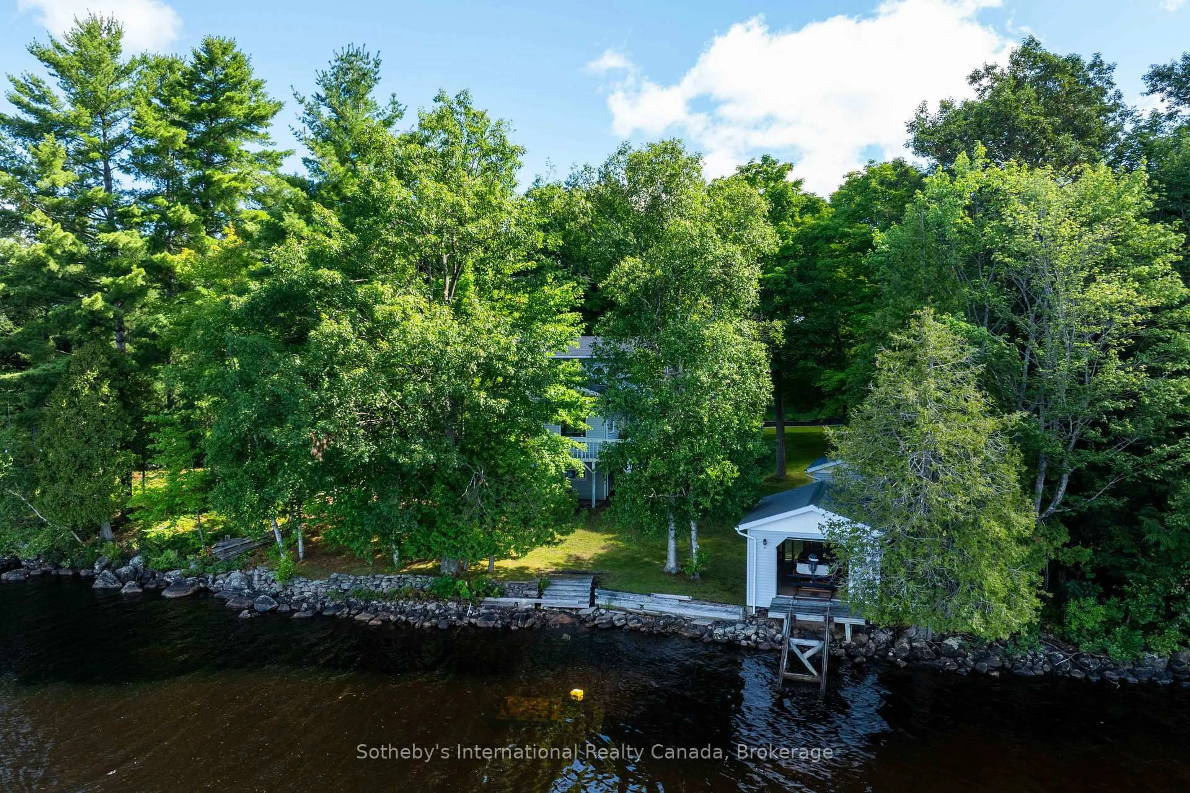 A pic from outside/outdoor area/front of a property/back of a property/a pic from drone, water/lake/river/ocean view for 326 CHIKOPI Rd, Magnetawan Ontario P0A 1P0