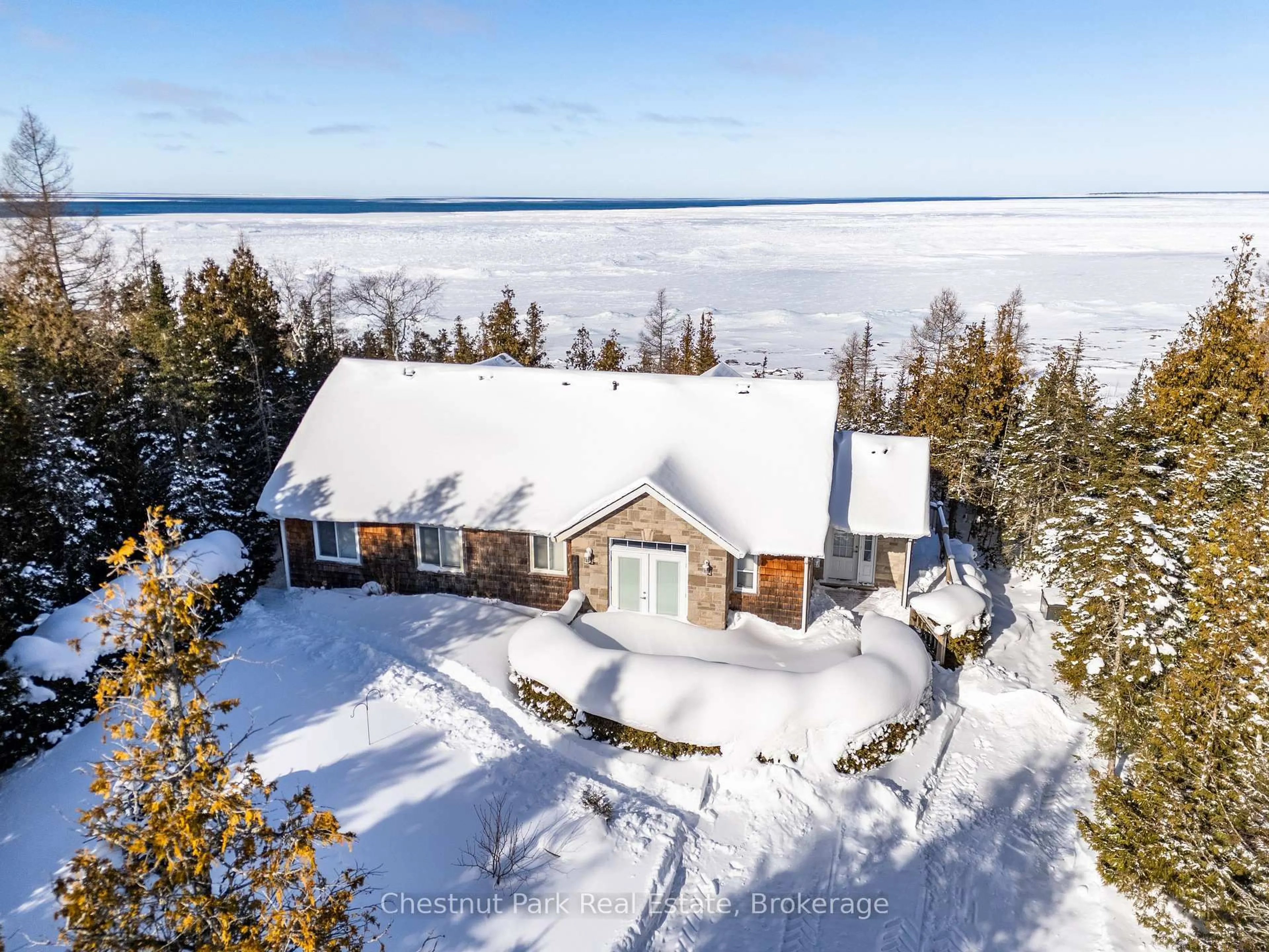 A pic from outside/outdoor area/front of a property/back of a property/a pic from drone, water/lake/river/ocean view for 94 Zorra Dr, Northern Bruce Peninsula Ontario N0H 2R0