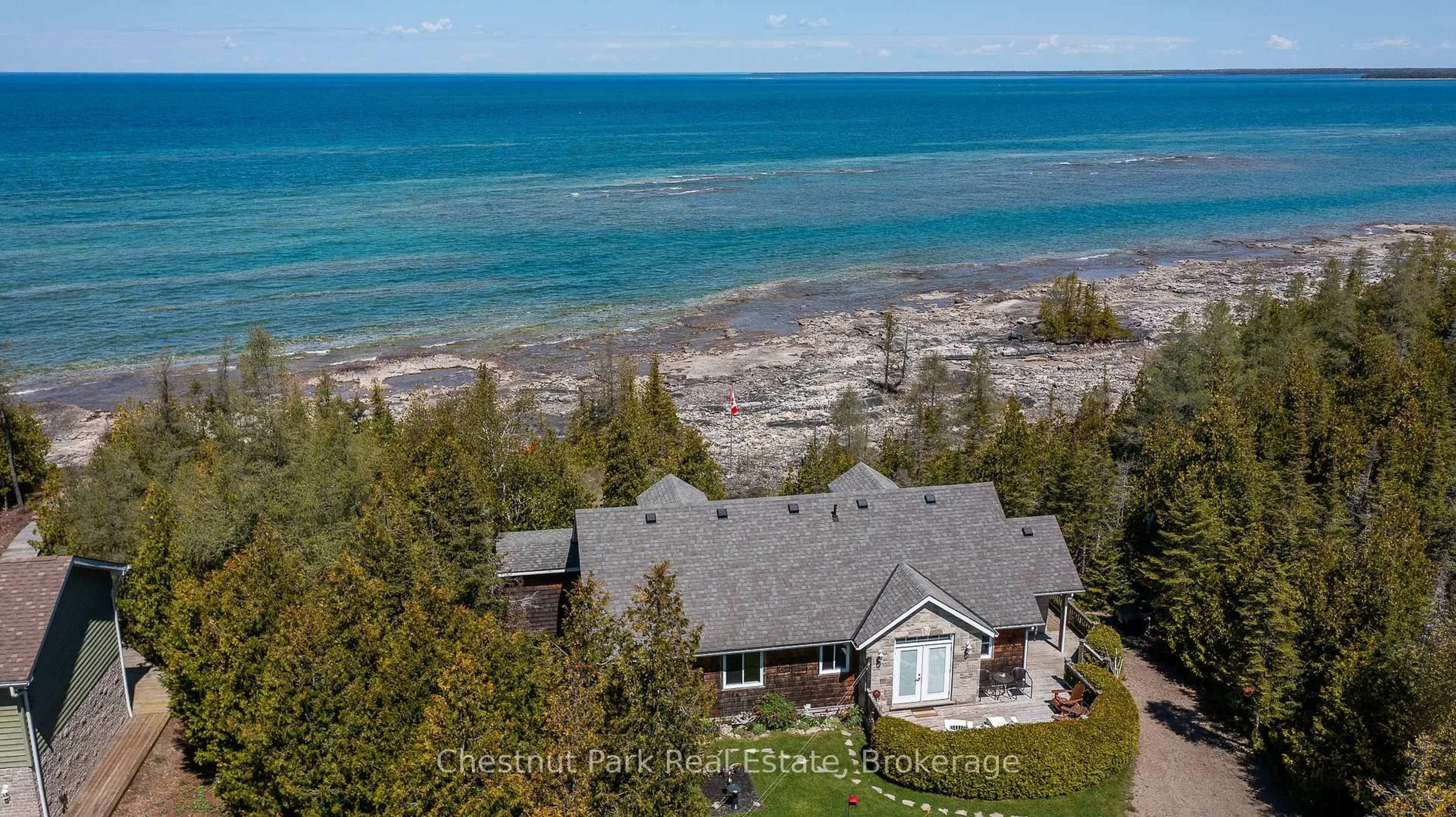 A pic from outside/outdoor area/front of a property/back of a property/a pic from drone, water/lake/river/ocean view for 94 Zorra Dr, Northern Bruce Peninsula Ontario N0H 2R0