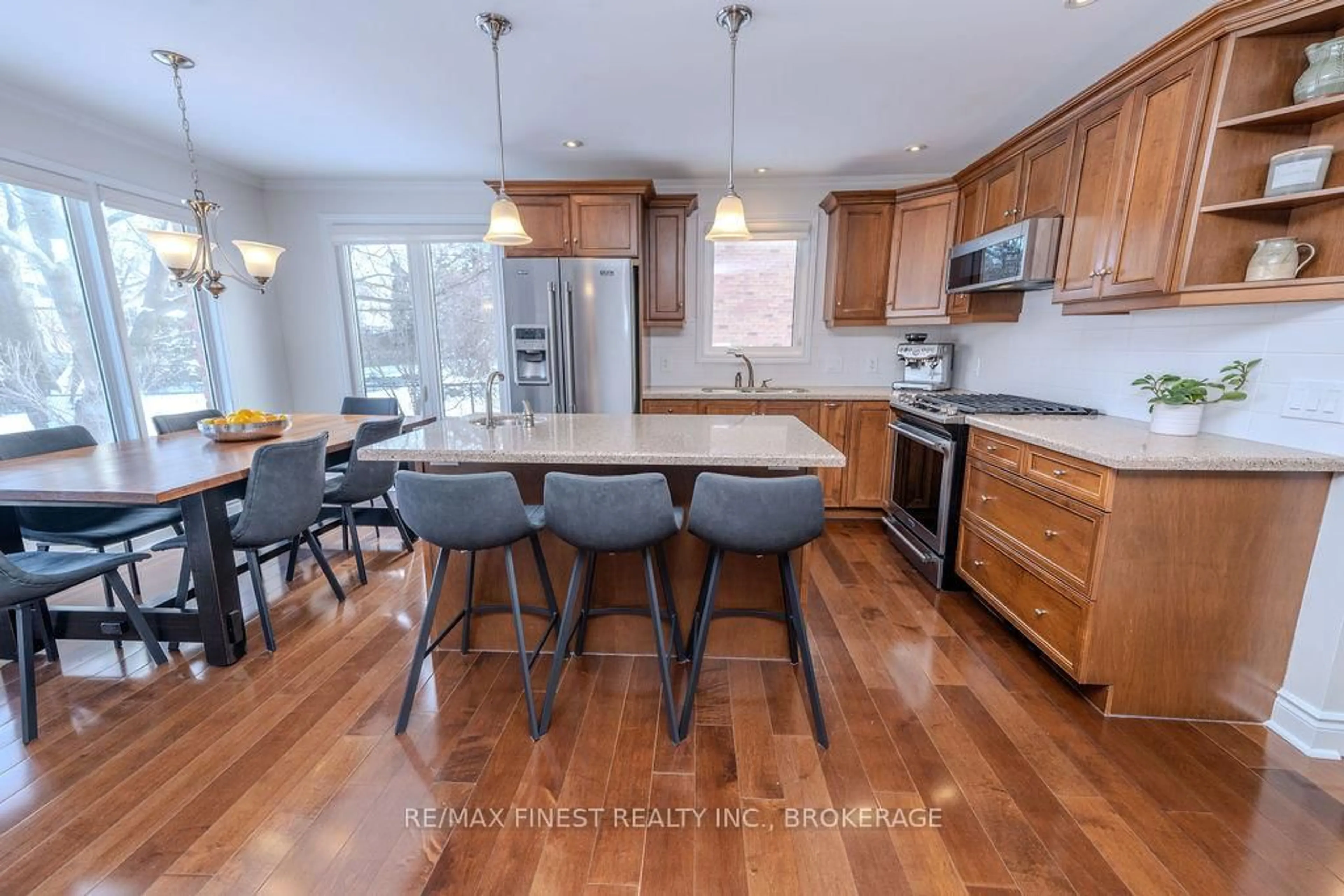 Open concept kitchen, wood/laminate floor for 410 Briarwood Dr, Kingston Ontario K7M 7V2