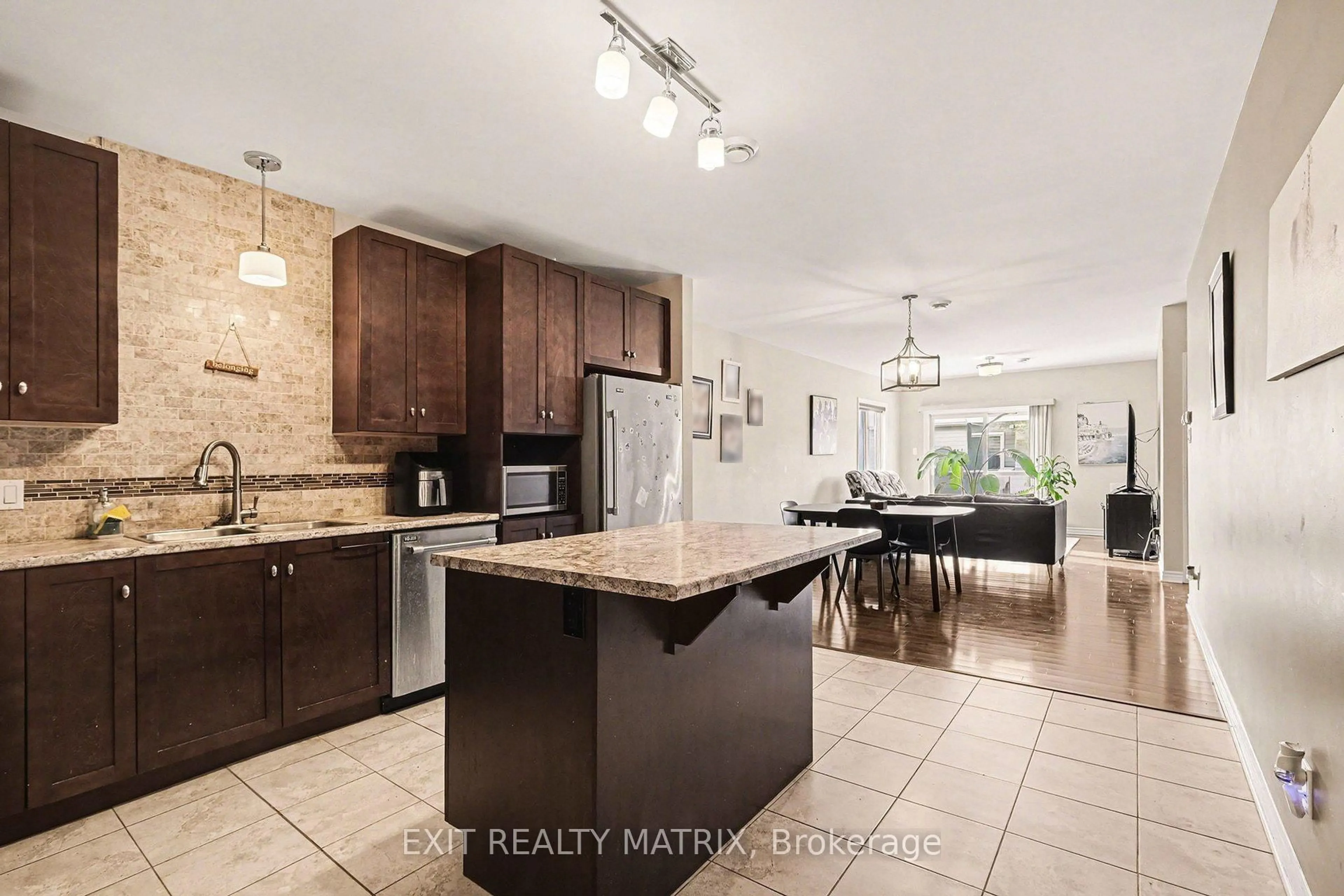 Open concept kitchen, ceramic/tile floor for 300 Solstice Cres #305, Russell Ontario K0A 1W0