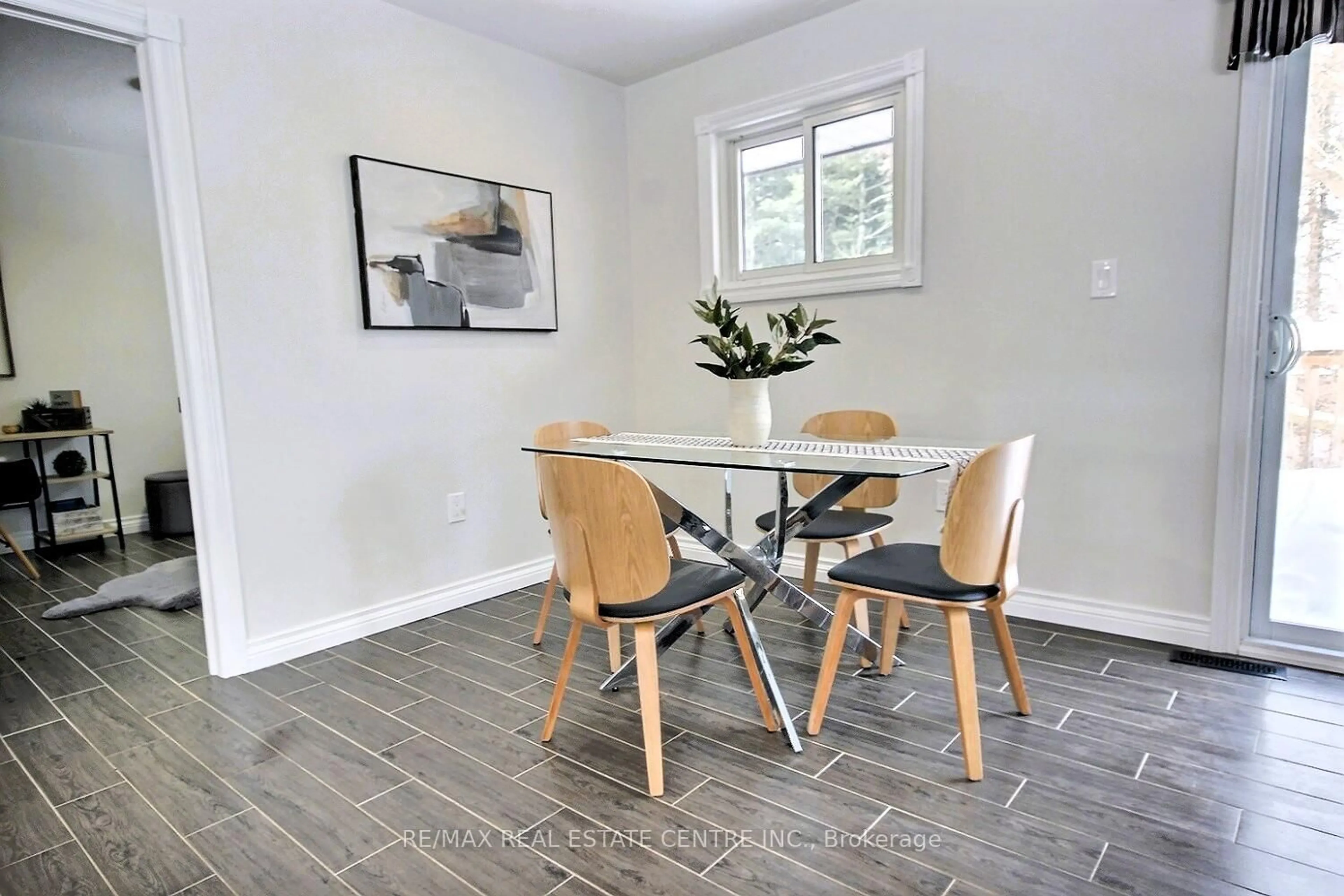 Dining room, wood/laminate floor for 68 Lauris Ave, Cambridge Ontario N1R 5L4