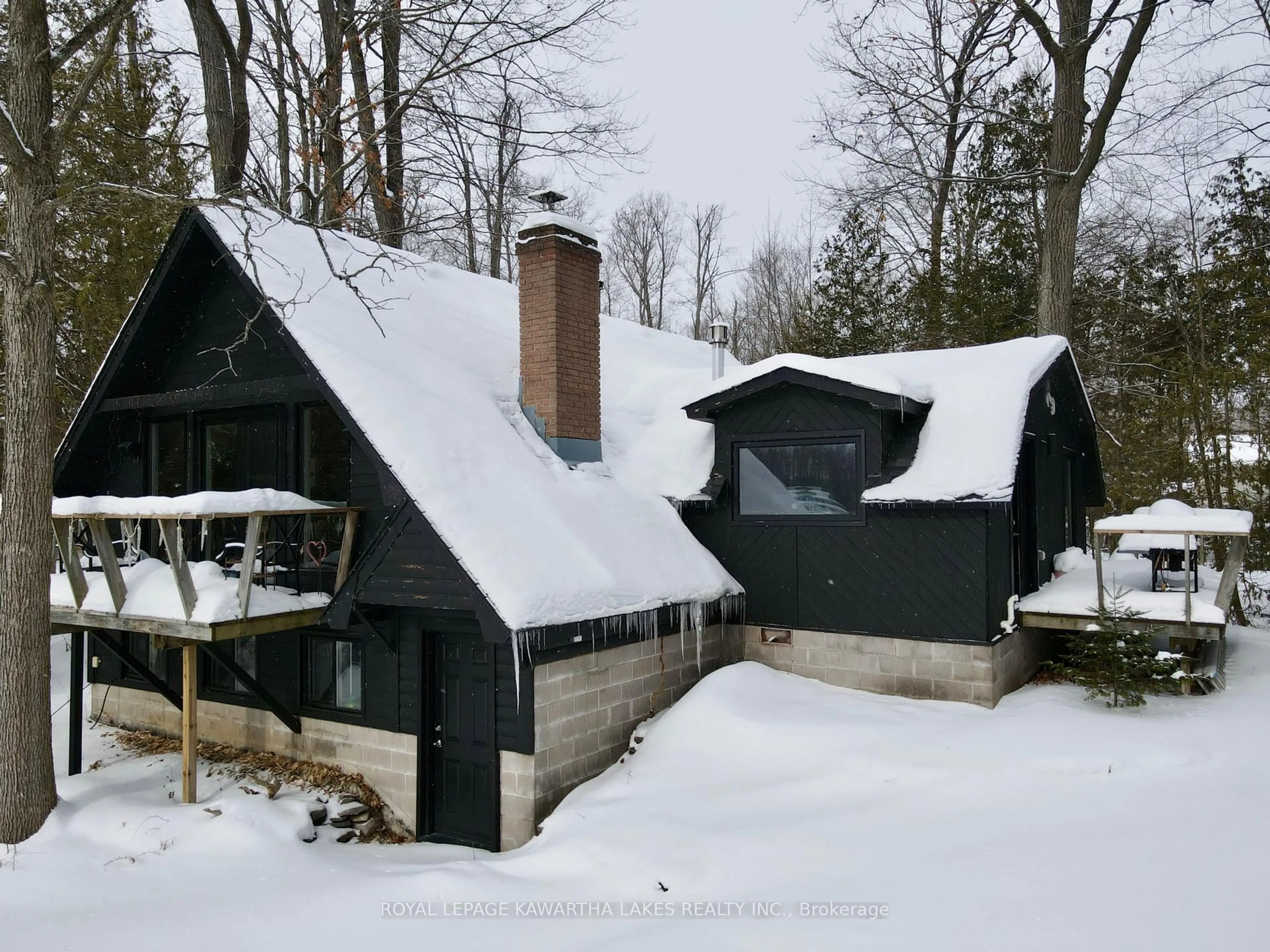 A pic from outside/outdoor area/front of a property/back of a property/a pic from drone, street for 8 Fr 62 St, Trent Lakes Ontario K0L 1J0