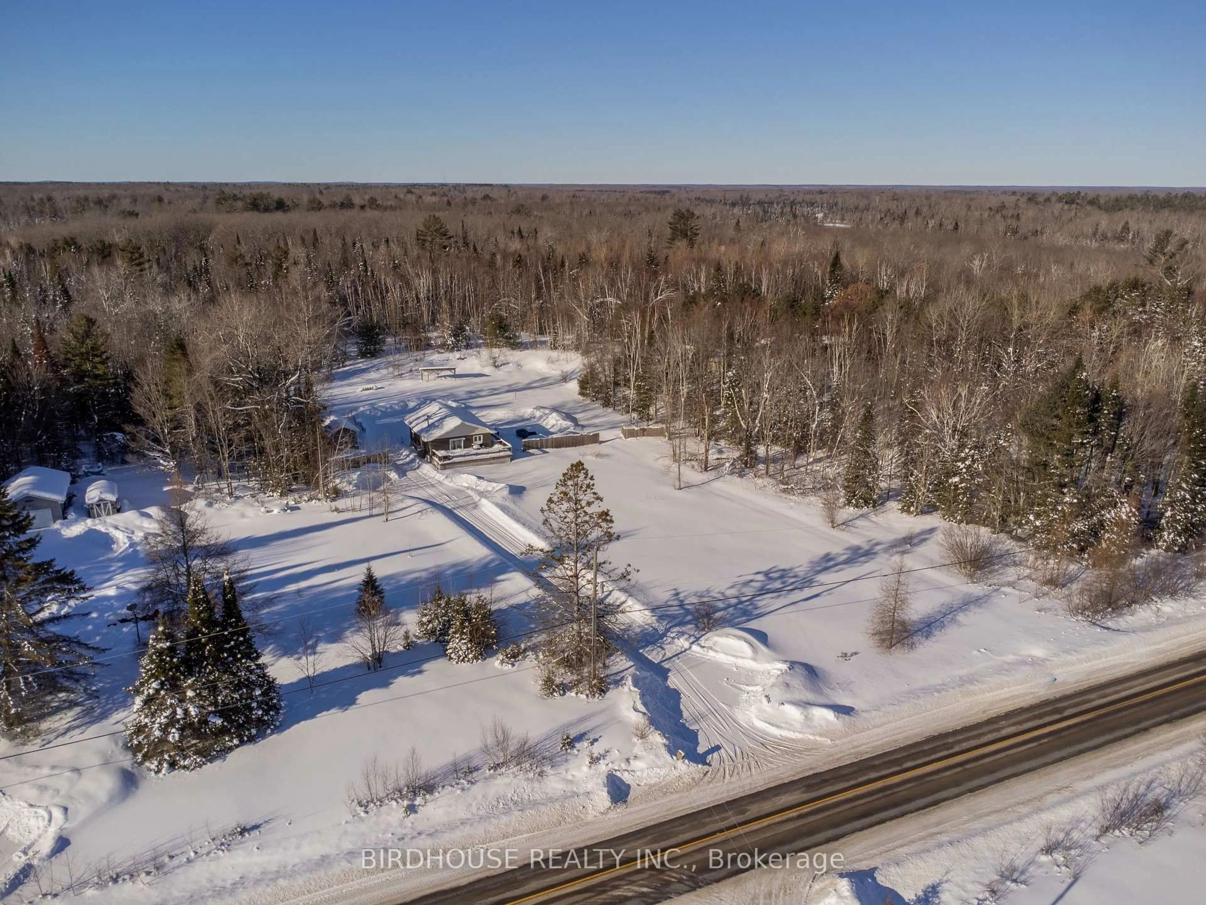 A pic from outside/outdoor area/front of a property/back of a property/a pic from drone, water/lake/river/ocean view for 3399 Gelert Rd, Minden Hills Ontario K0M 2K0