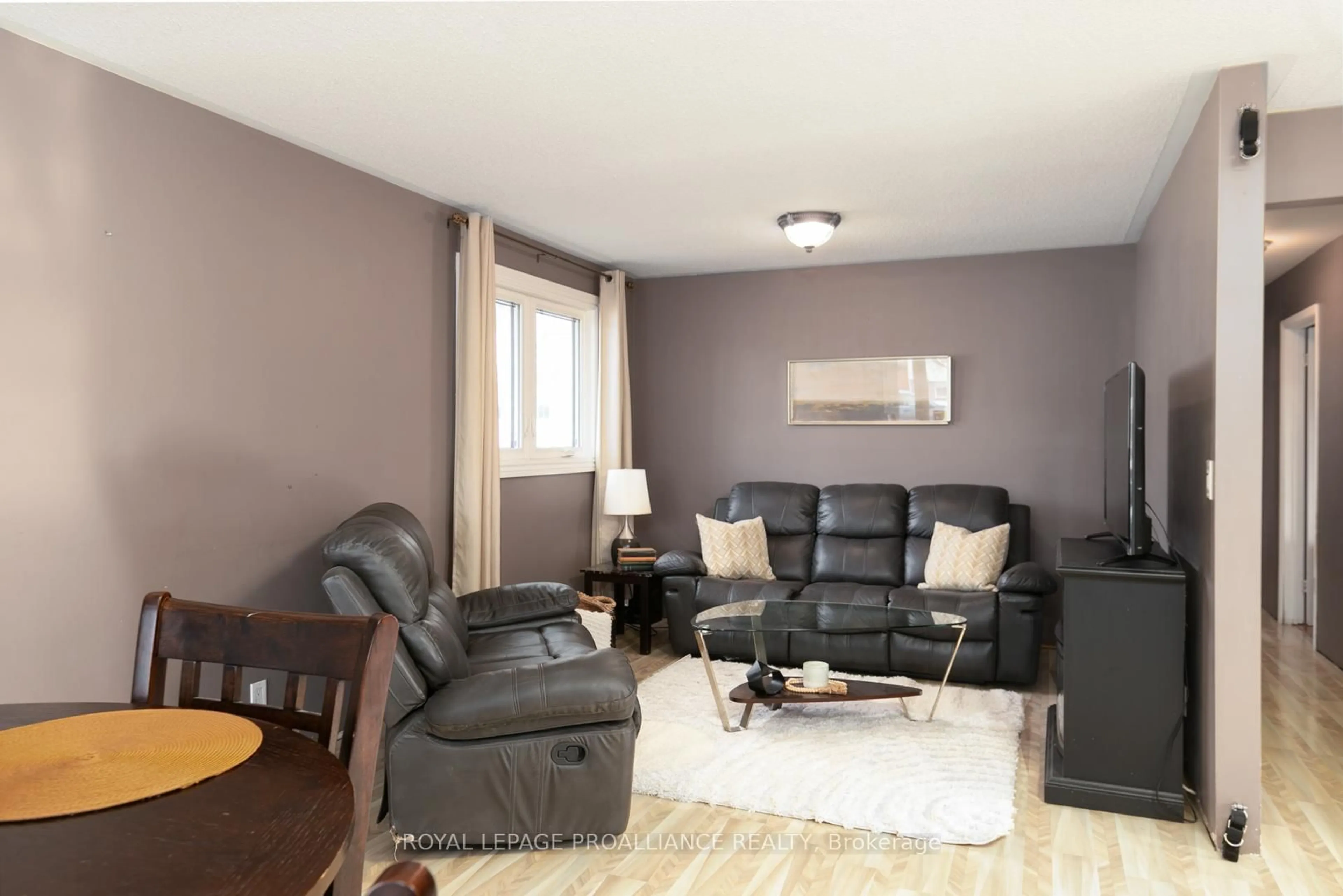 Living room with furniture, wood/laminate floor for 43 Alnet Dr, Belleville Ontario K8P 4W3