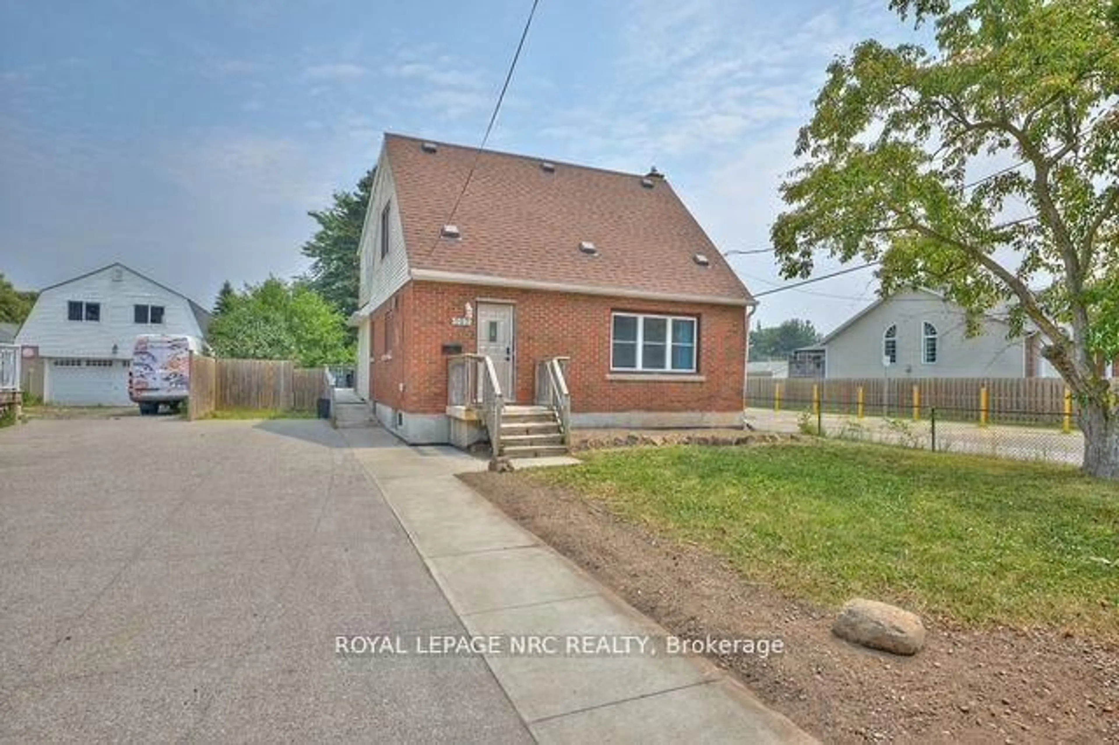 Home with brick exterior material, street for 3090 Dorchester Rd, Niagara Falls Ontario L2J 2Z7
