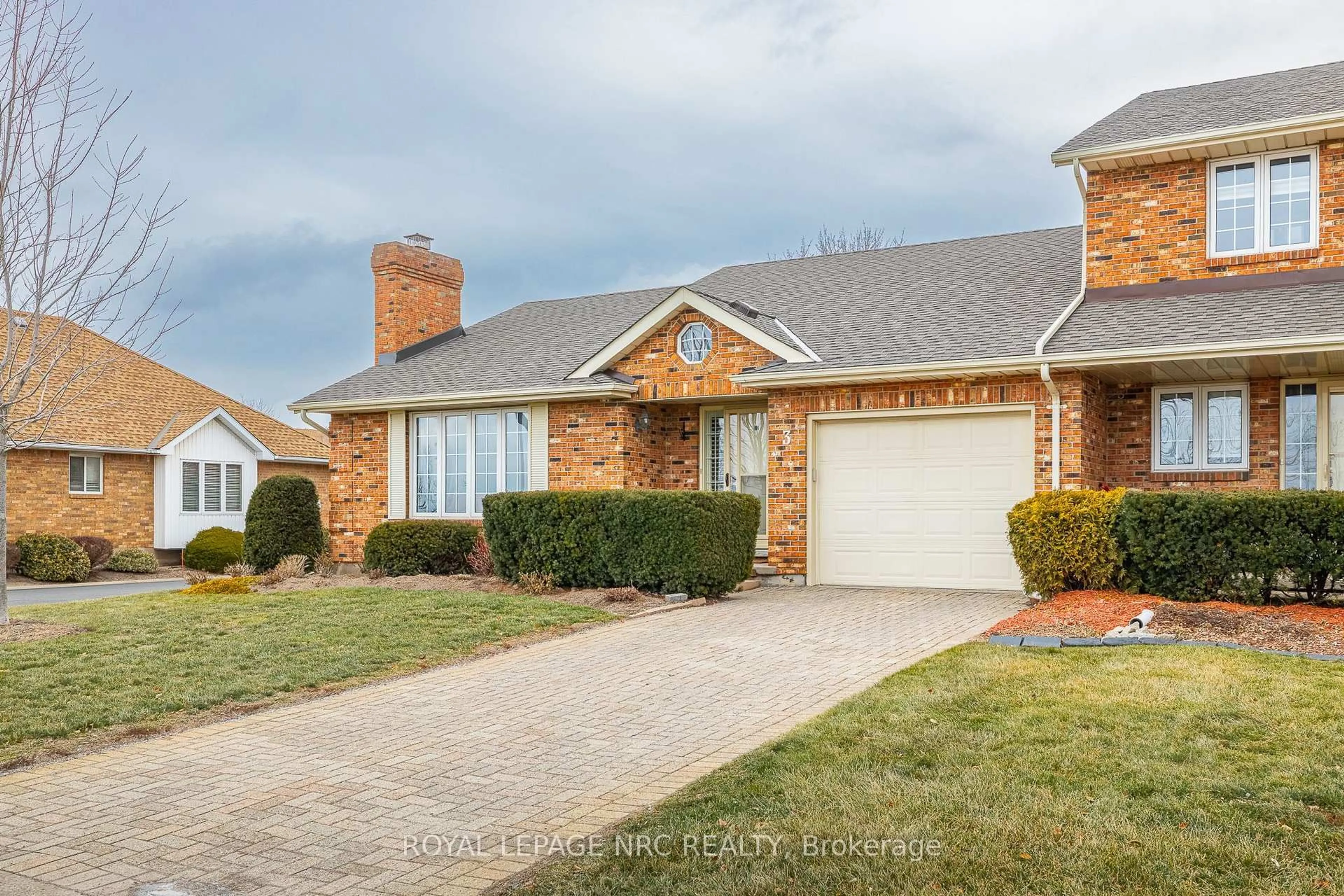 Home with brick exterior material, street for 2720 Mewburn Rd #3, Niagara Falls Ontario L2J 4J5