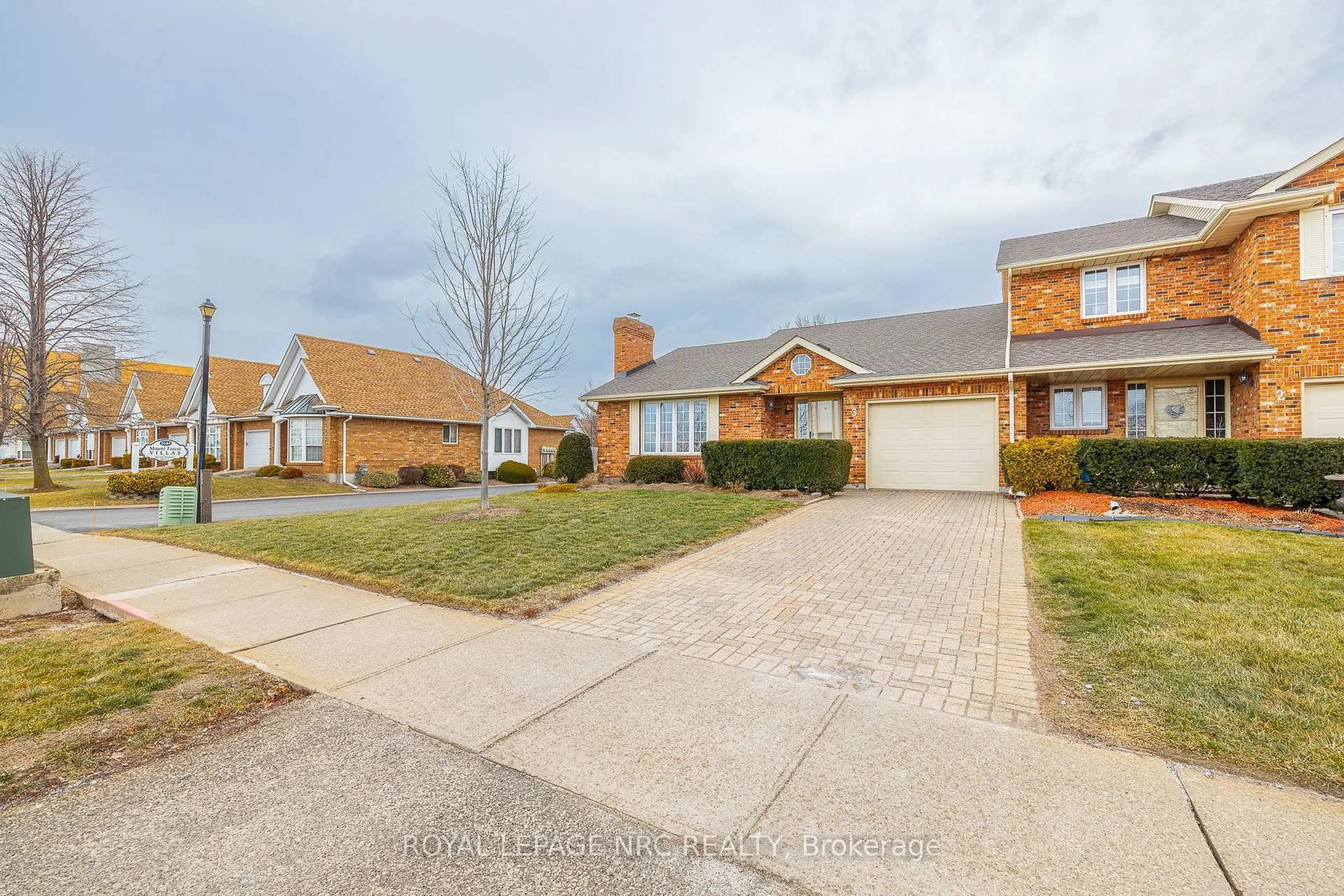 Home with brick exterior material, street for 2720 Mewburn Rd #3, Niagara Falls Ontario L2J 4J5