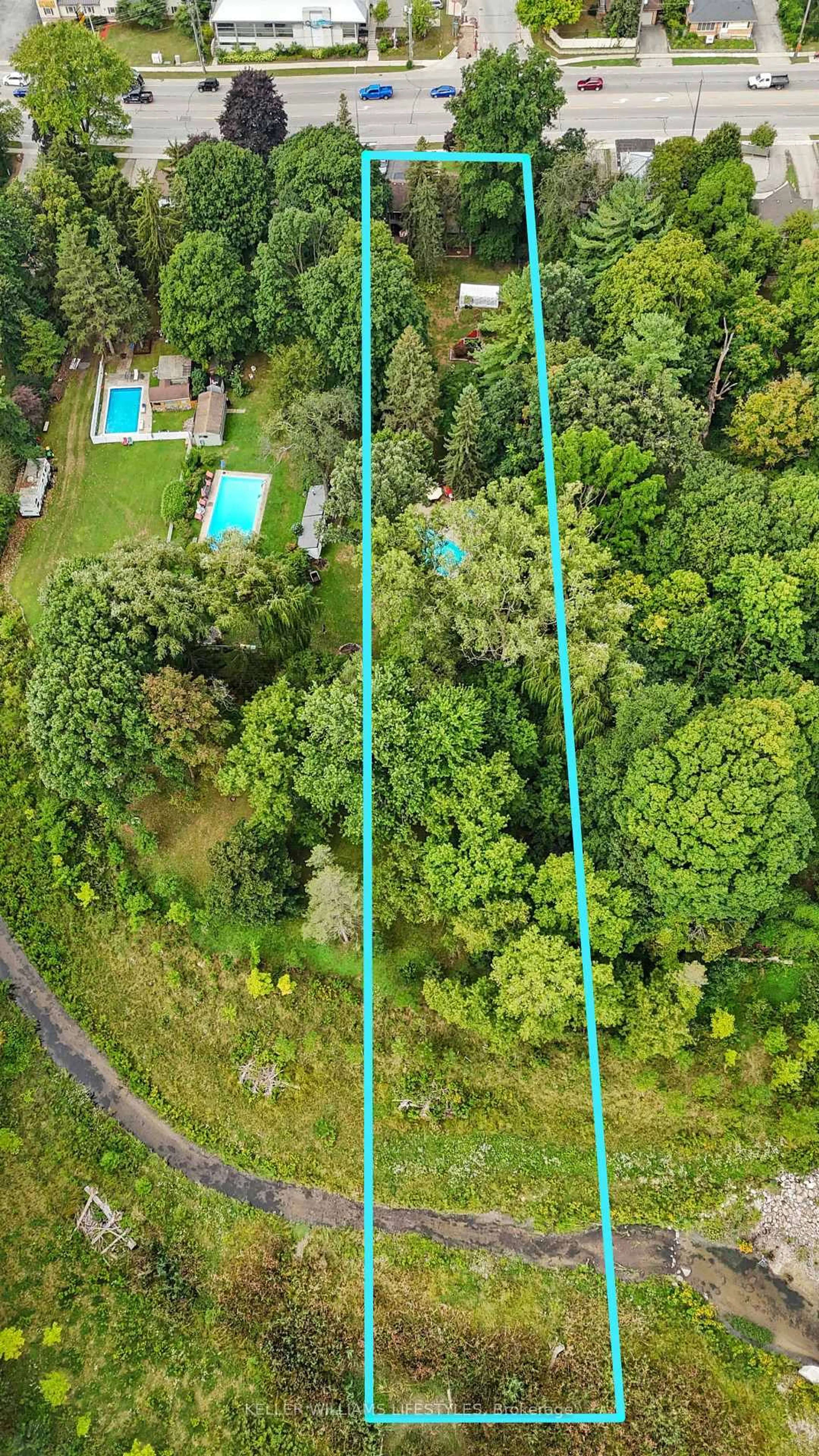 A pic from outside/outdoor area/front of a property/back of a property/a pic from drone, forest/trees view for 577 Wonderland Rd, London North Ontario N6H 3E2