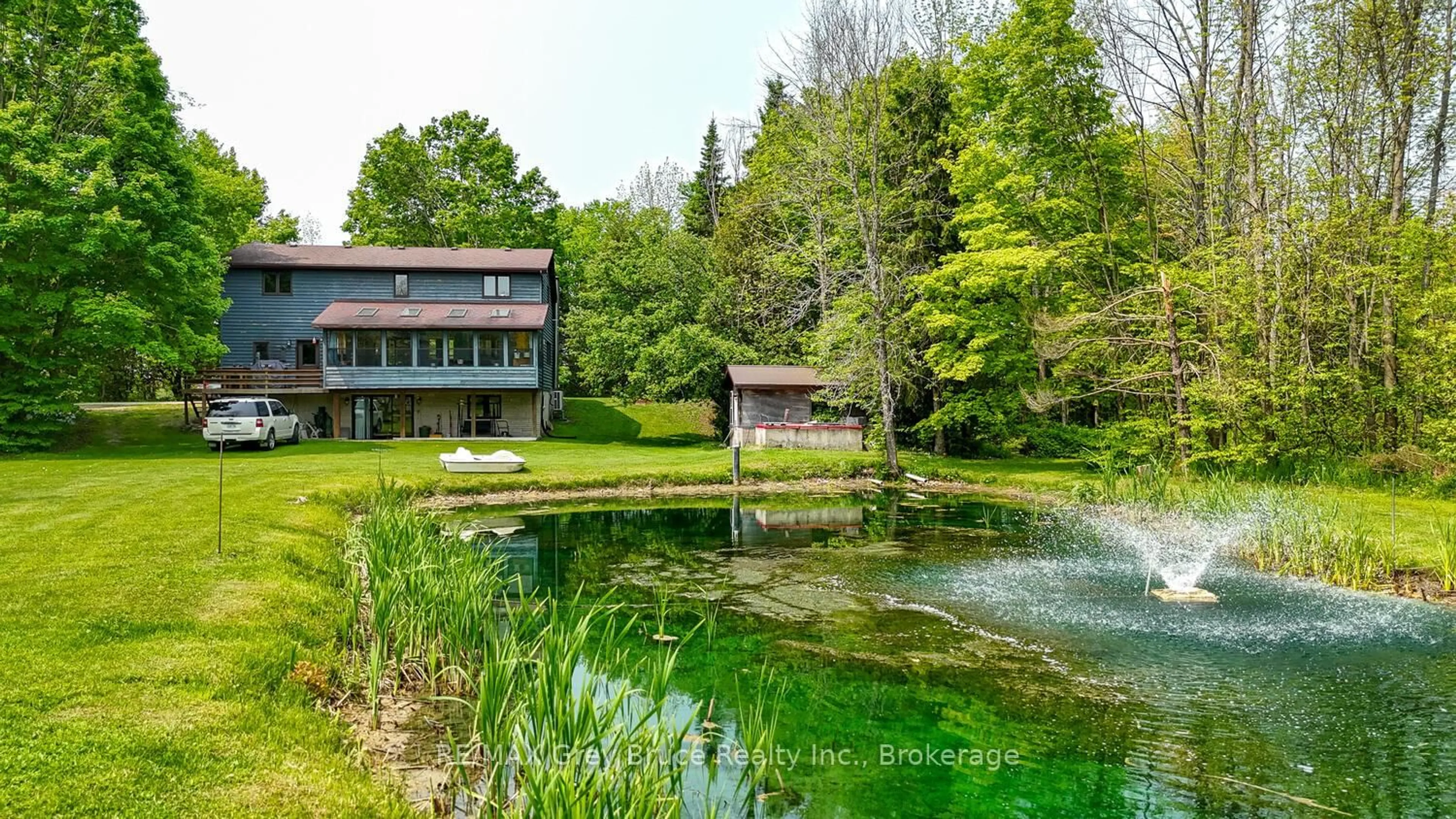 A pic from outside/outdoor area/front of a property/back of a property/a pic from drone, water/lake/river/ocean view for 1033 Bruce Road 9, South Bruce Peninsula Ontario N0H 2T0