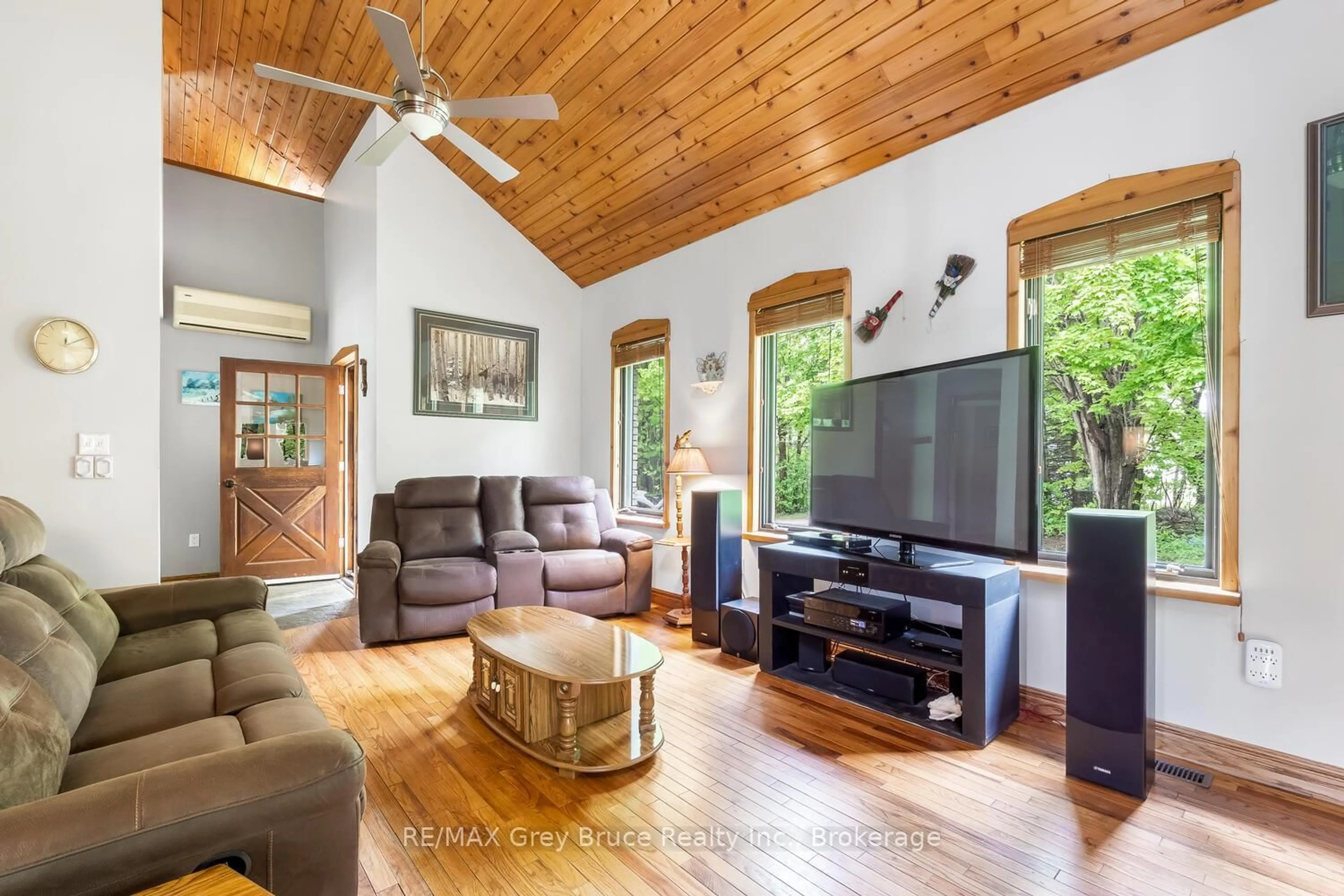 Living room with furniture, wood/laminate floor for 1033 Bruce Road 9, South Bruce Peninsula Ontario N0H 2T0