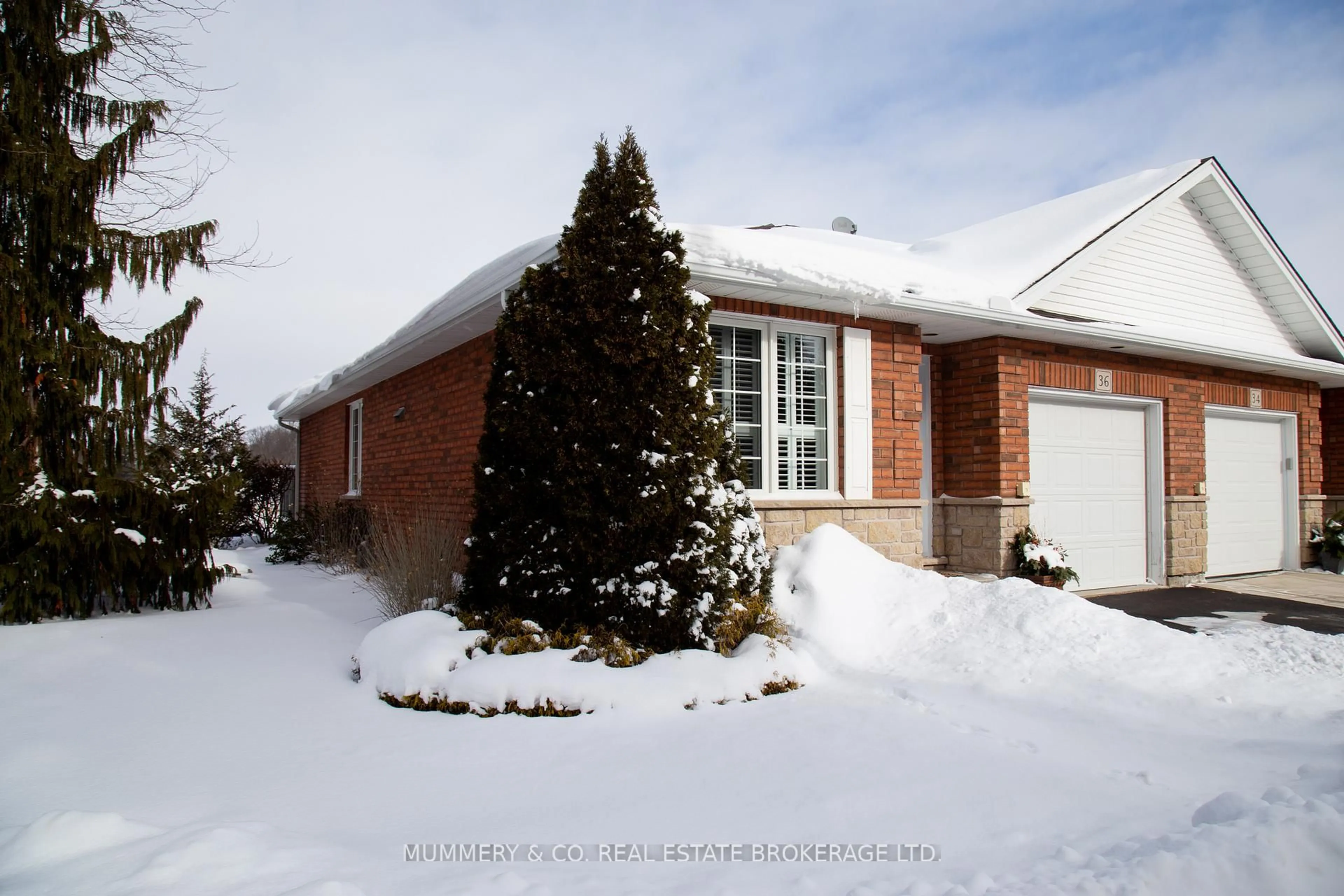 Home with brick exterior material, street for 36 Clonmel Lane, Norfolk Ontario N0A 1N1
