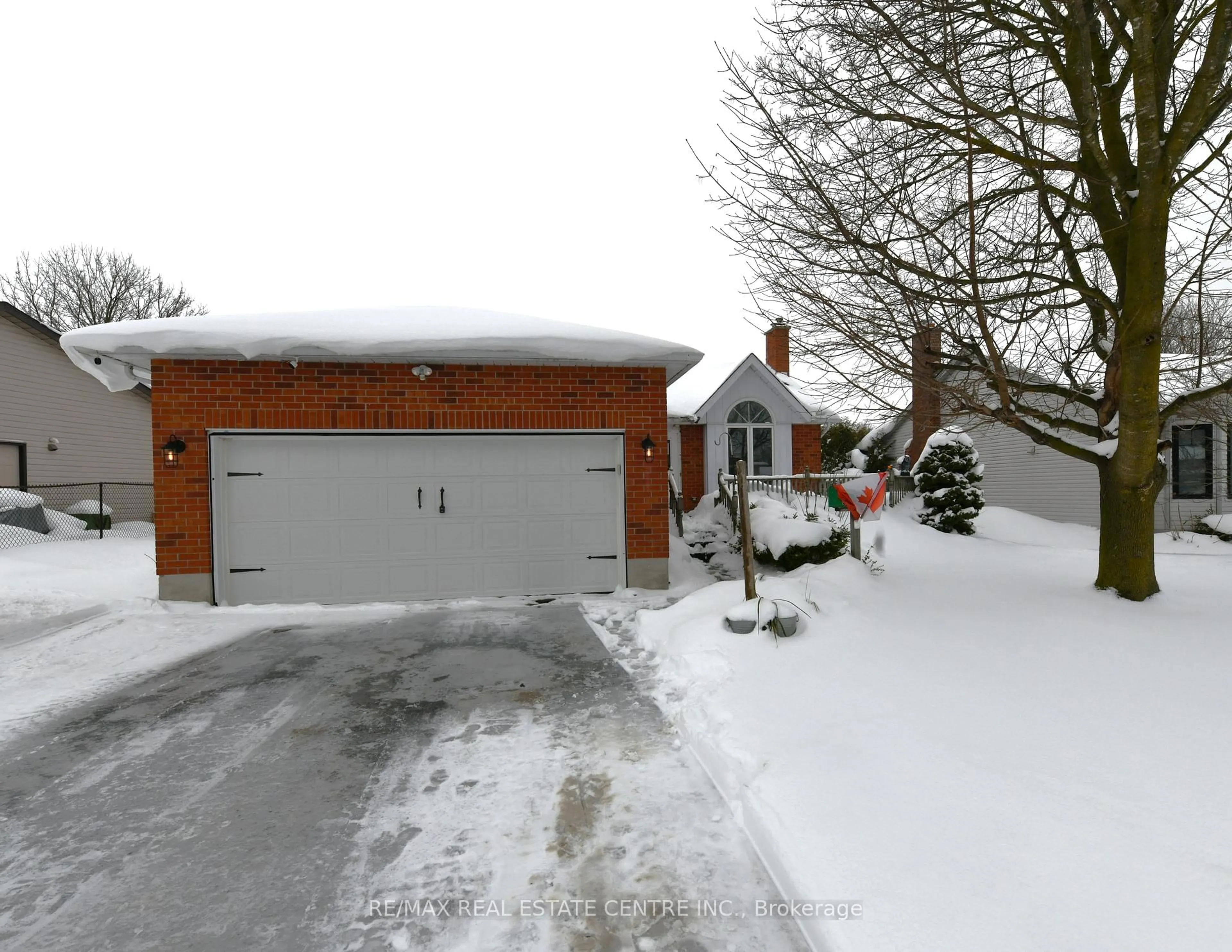 A pic from outside/outdoor area/front of a property/back of a property/a pic from drone, street for 115 Miller Cres, Minto Ontario N0G 2P0