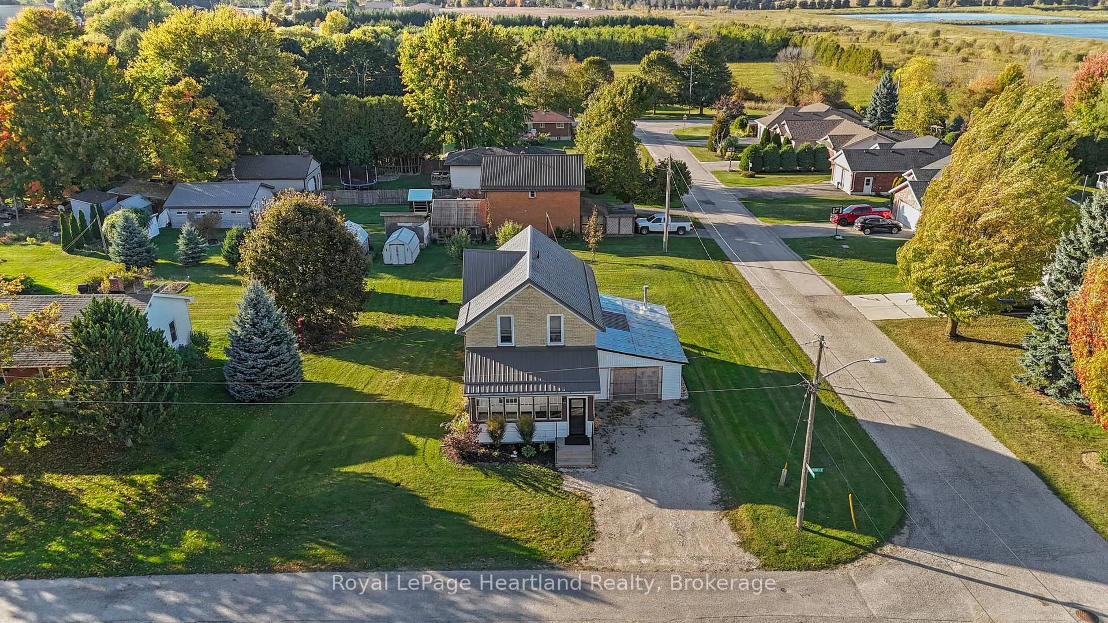 A pic from outside/outdoor area/front of a property/back of a property/a pic from drone, street for 15 QUEEN St, Minto Ontario N0G 1M0