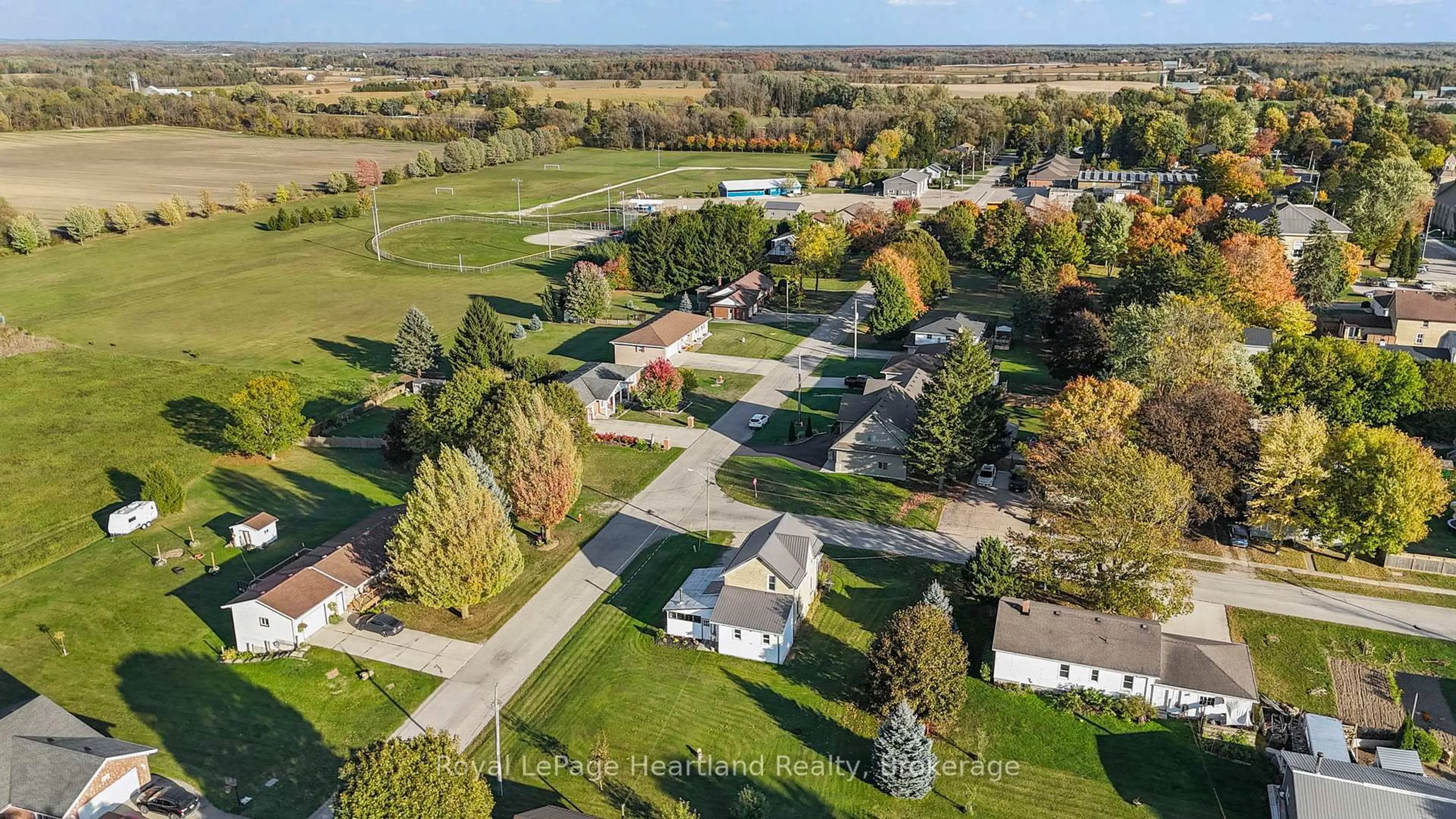 A pic from outside/outdoor area/front of a property/back of a property/a pic from drone, street for 15 QUEEN St, Minto Ontario N0G 1M0