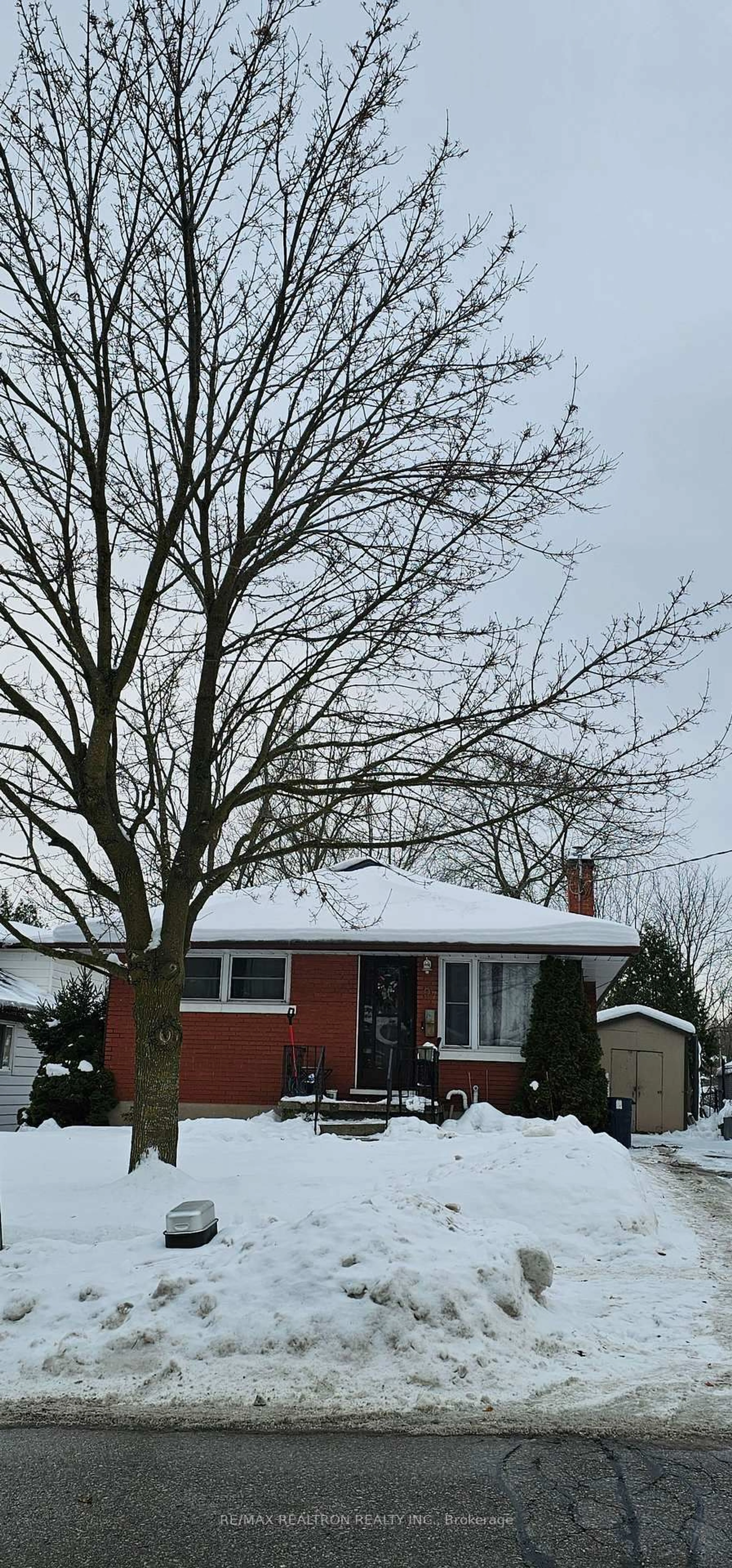 Home with brick exterior material, street for 97 Belmont Ave, Kitchener Ontario N2M 4B8