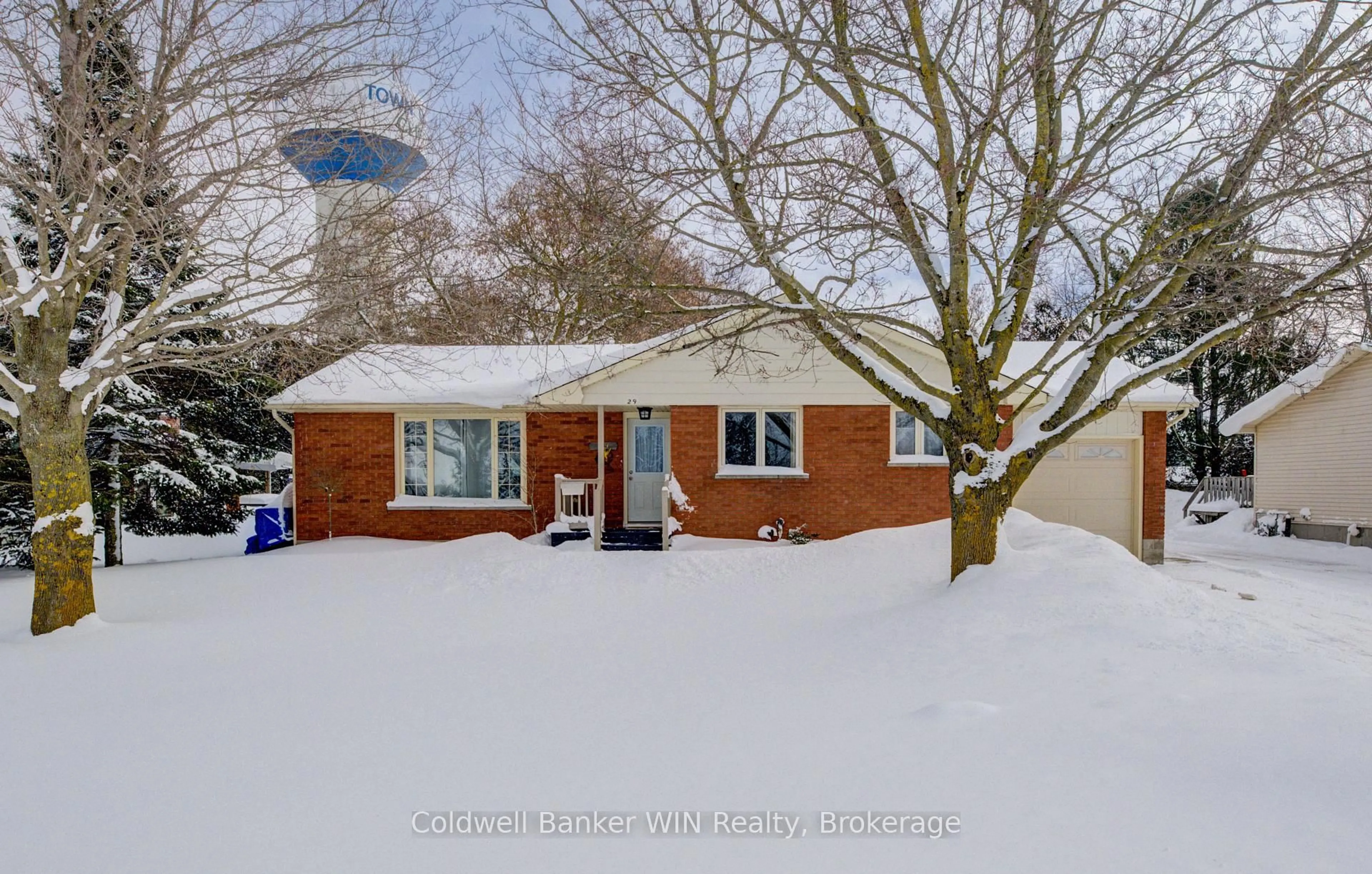 A pic from outside/outdoor area/front of a property/back of a property/a pic from drone, street for 29 John St, Minto Ontario N0G 1M0