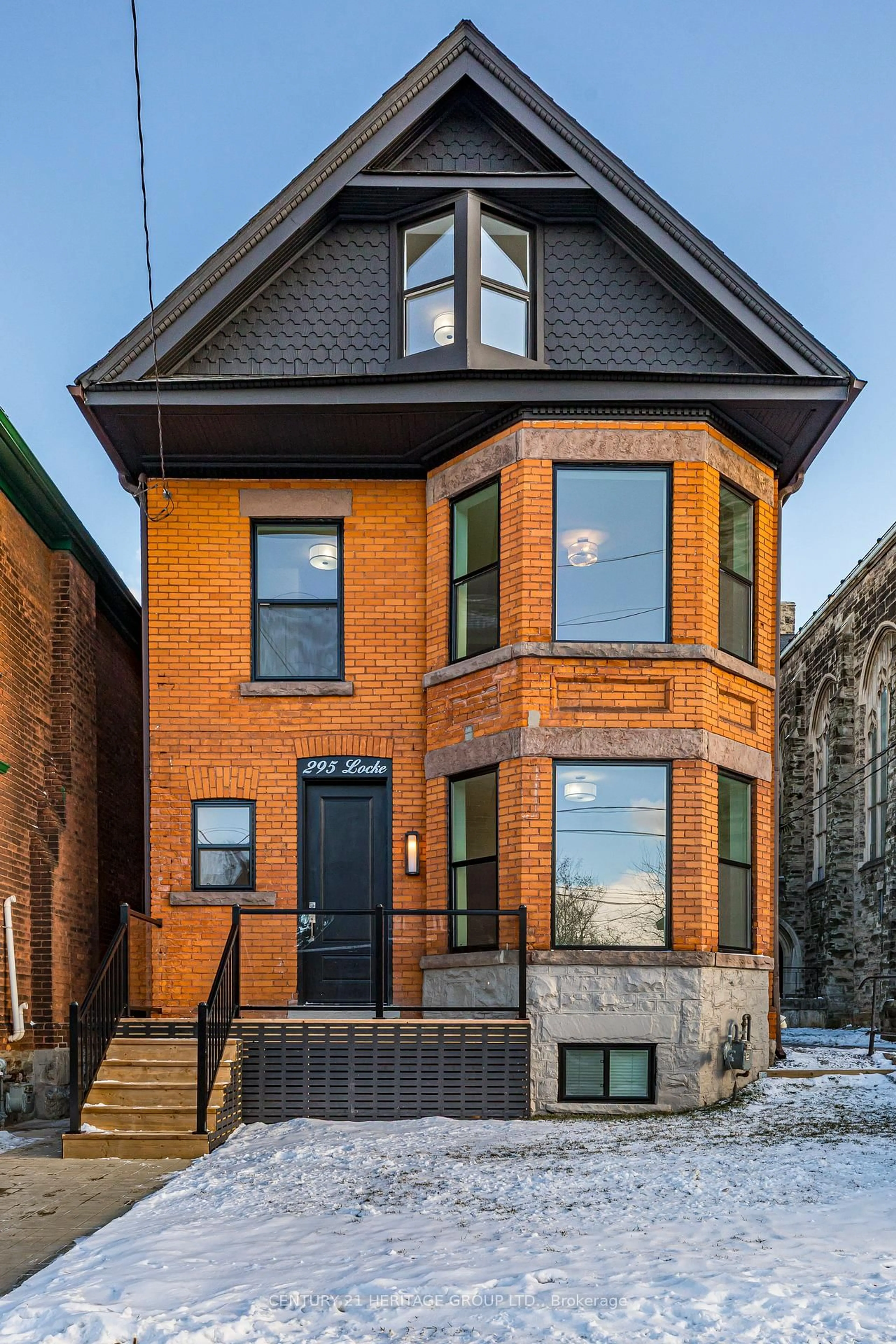 Home with brick exterior material, street for 295 Locke St, Hamilton Ontario L8P 4C3