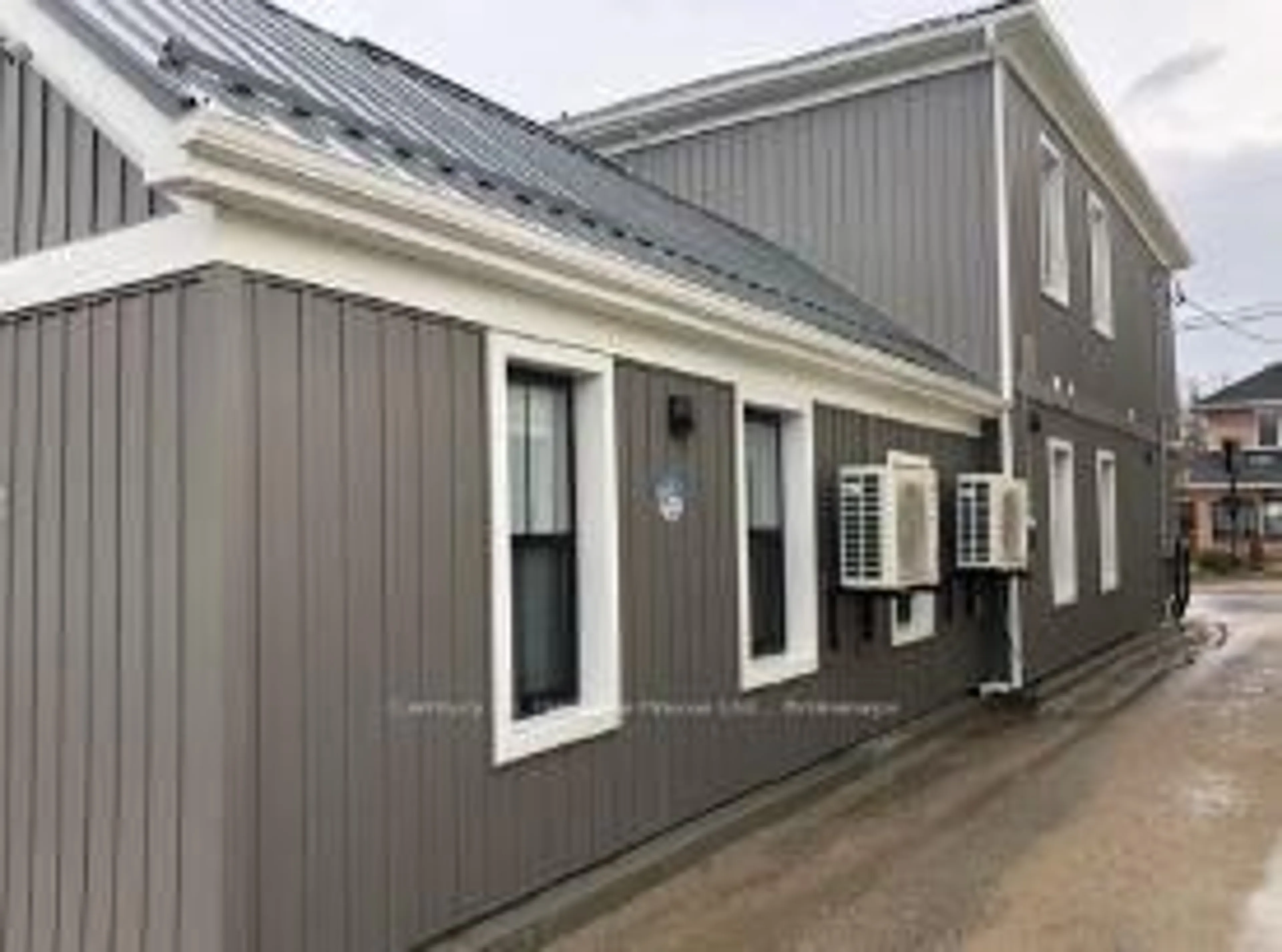 Home with vinyl exterior material, building for 239-249 Main St, Wellington North Ontario N0G 2L1