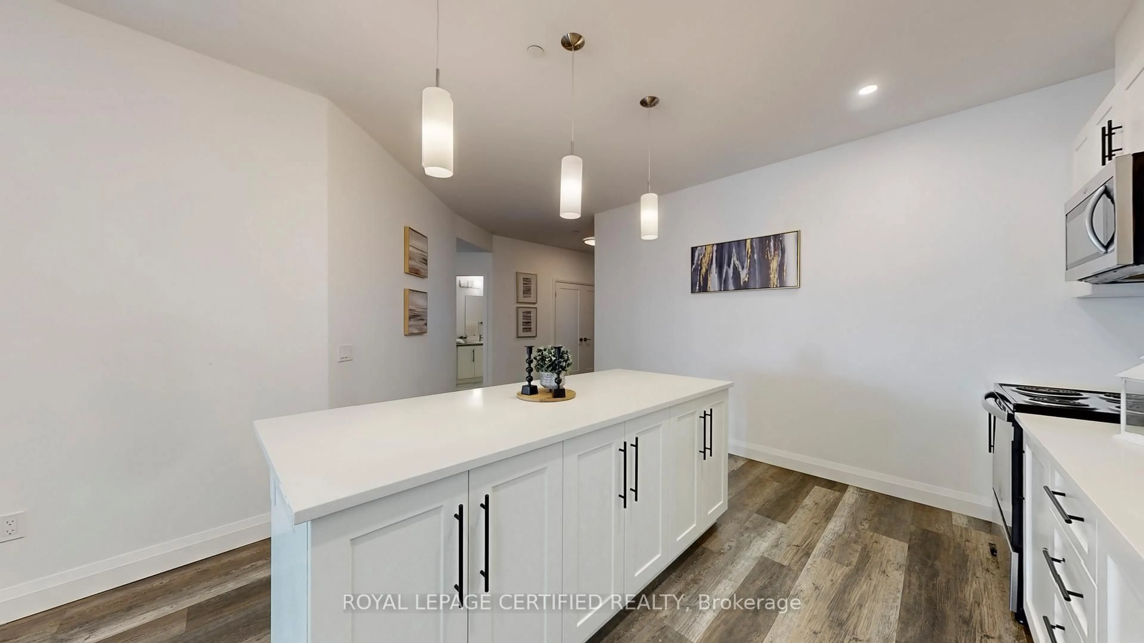 Open concept kitchen, unknown for 332 Gosling Gdns #411, Guelph Ontario N1L 1G7