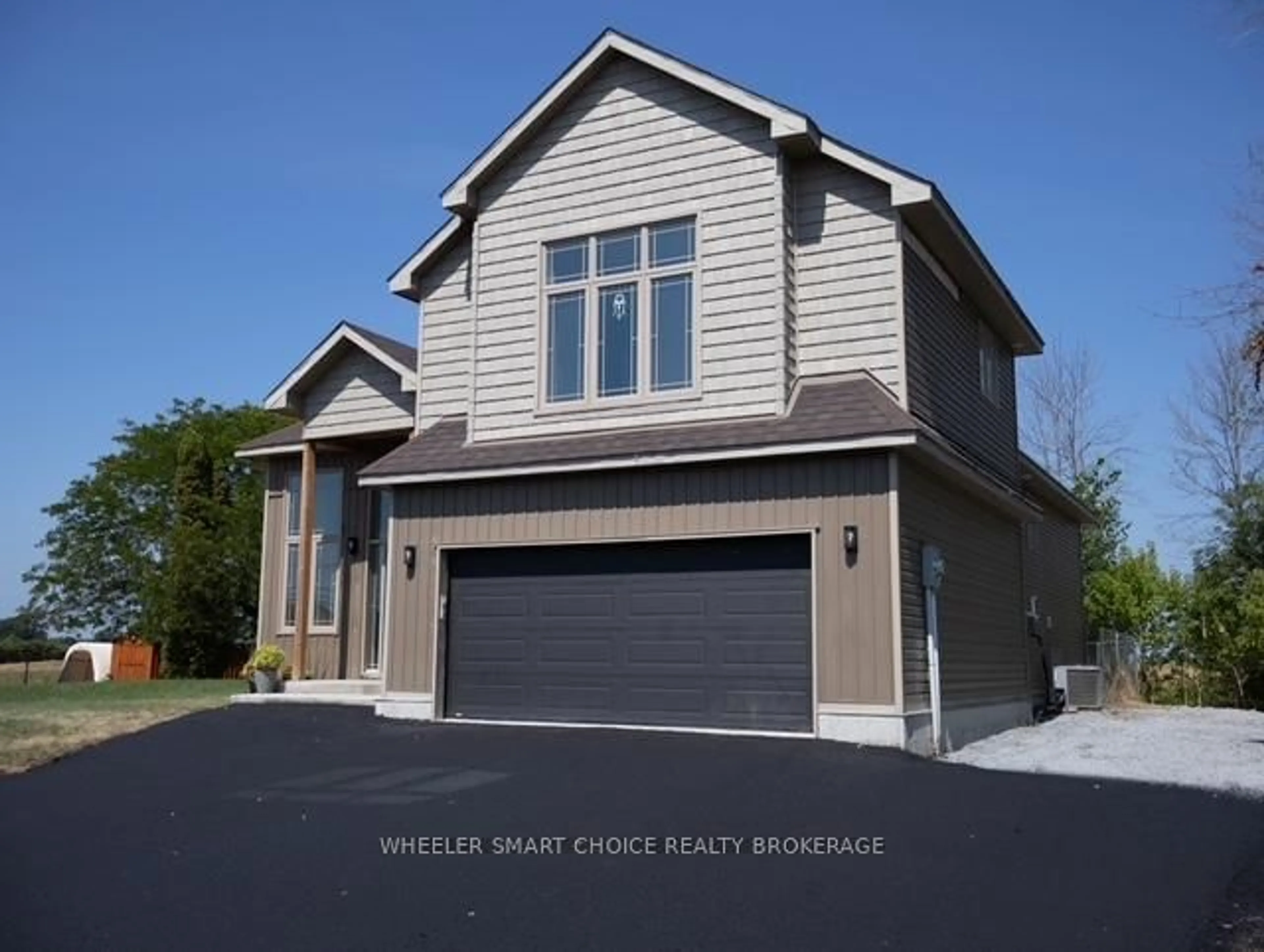 Home with vinyl exterior material, street for 15765 Manning Rd, South Stormont Ontario K0C 1M0