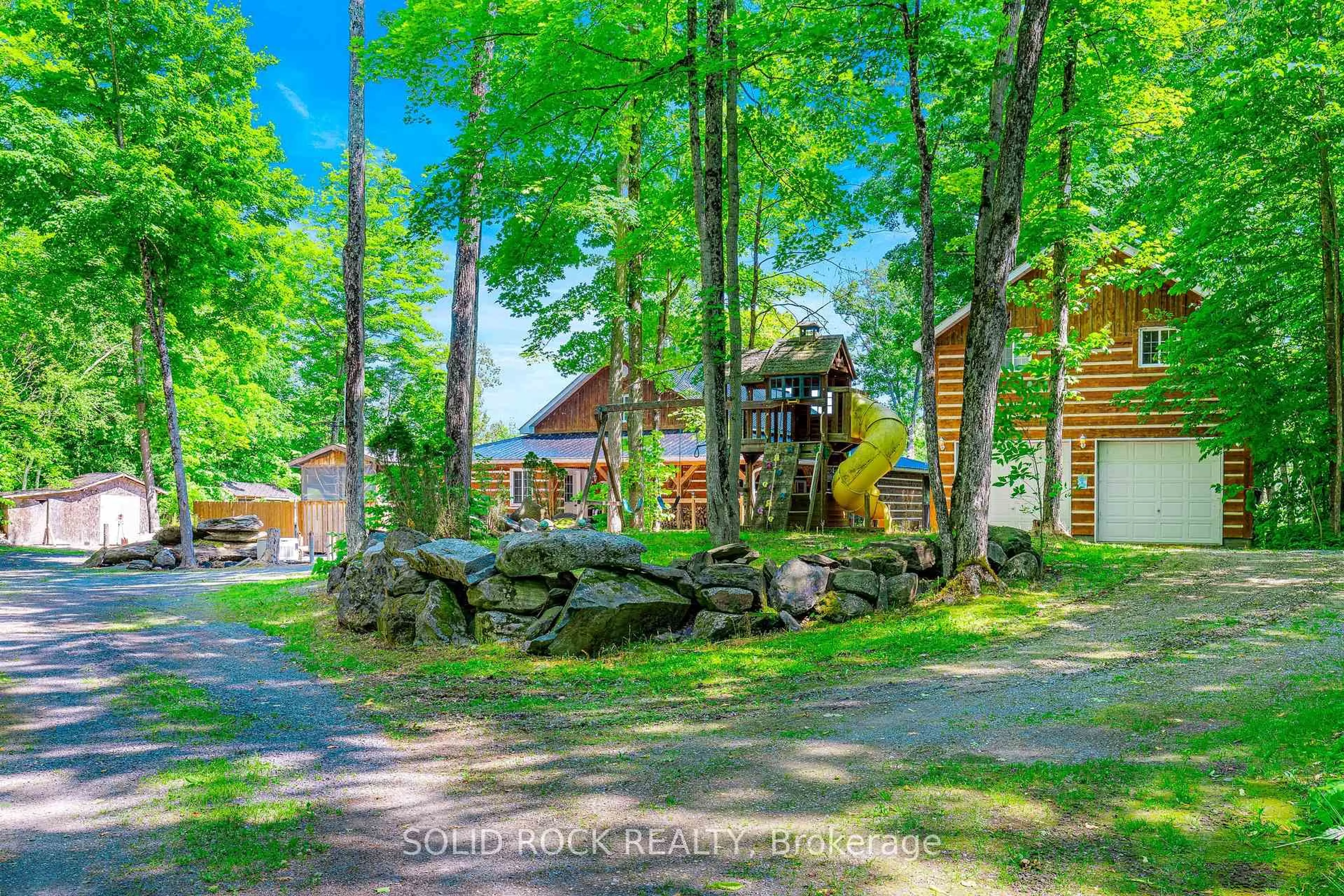 A pic from outside/outdoor area/front of a property/back of a property/a pic from drone, forest/trees view for 261 Lacourse Lane, White Lake Ontario K0A 3L0