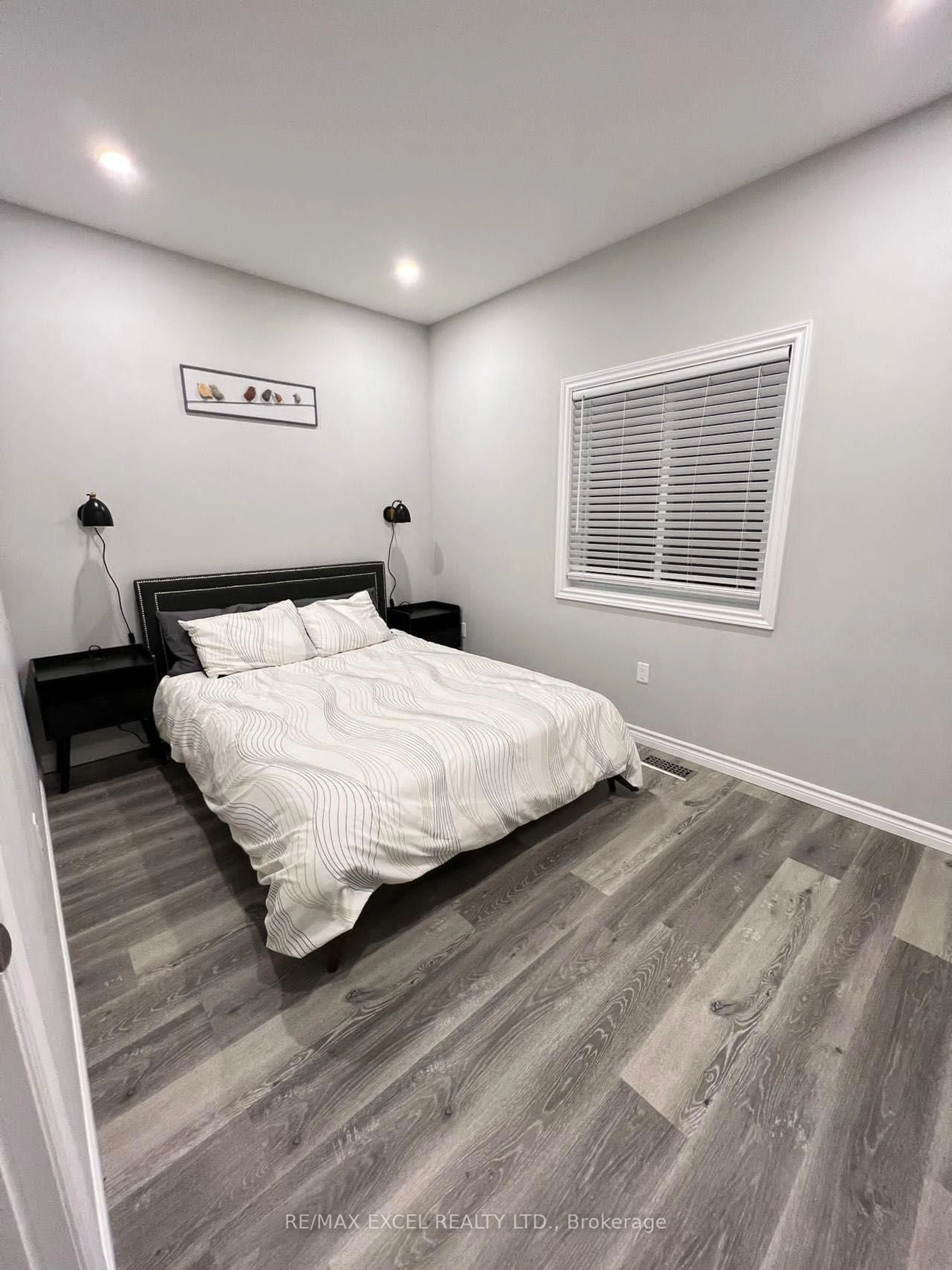 Bedroom with bed, wood/laminate floor for 205 Snug Harbour Rd, Kawartha Lakes Ontario K9V 4R6