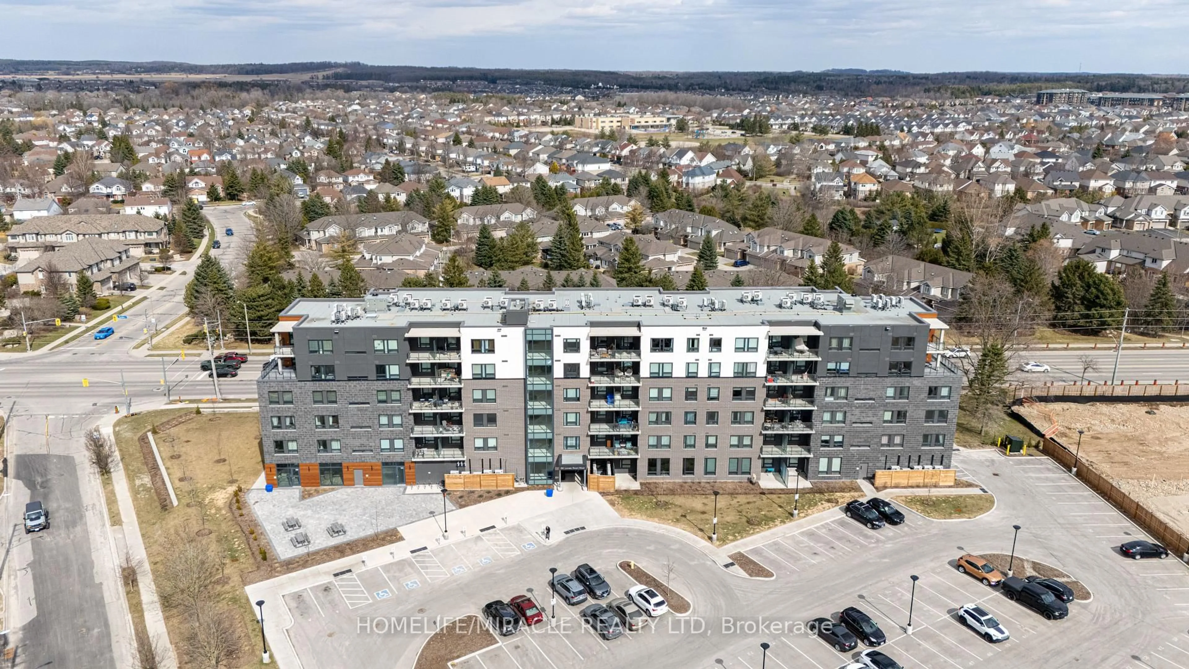 A pic from outside/outdoor area/front of a property/back of a property/a pic from drone, building for 26 Lowes Rd #402, Guelph Ontario N1G 4X2