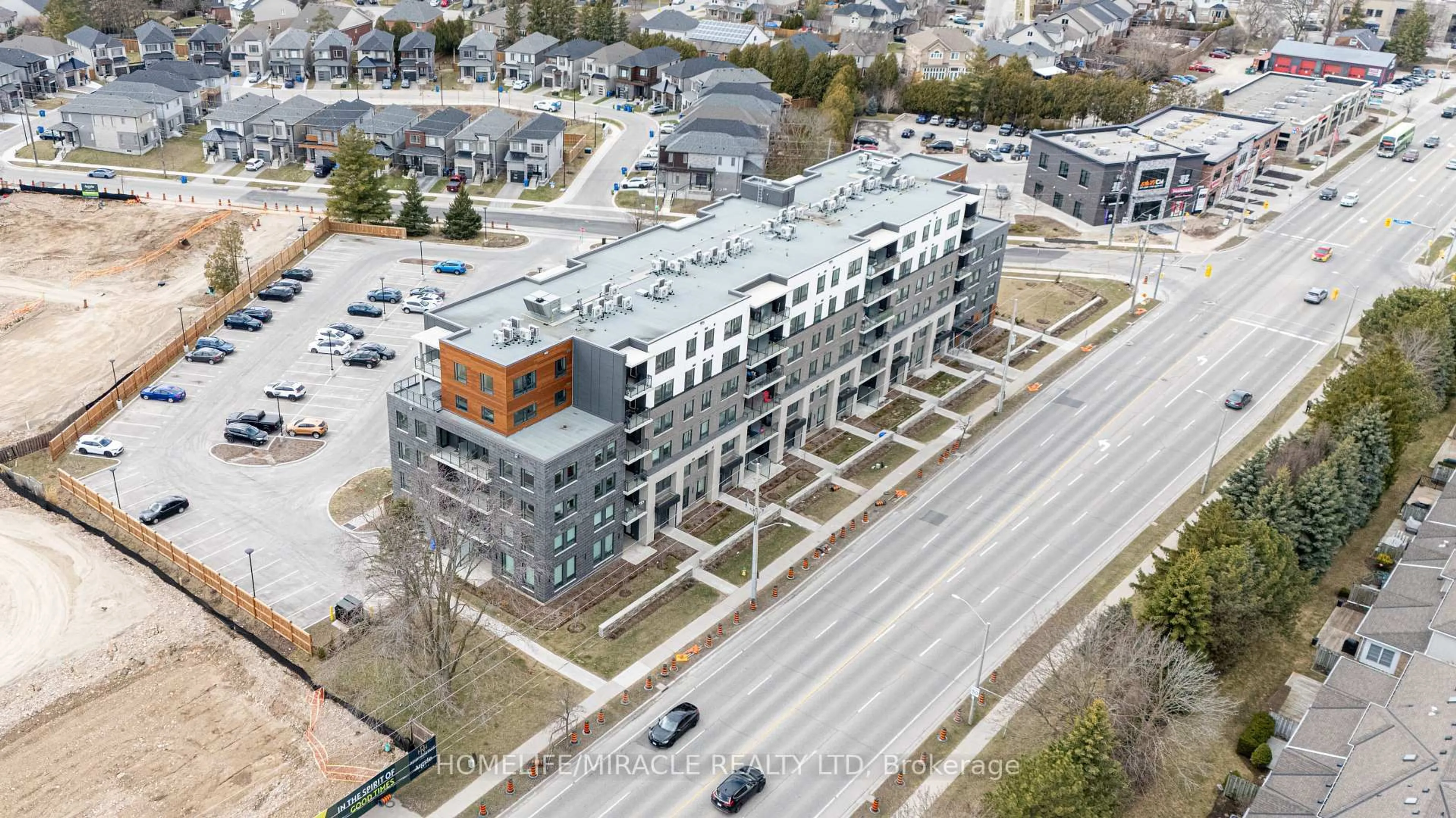 A pic from outside/outdoor area/front of a property/back of a property/a pic from drone, building for 26 Lowes Rd #402, Guelph Ontario N1G 4X2