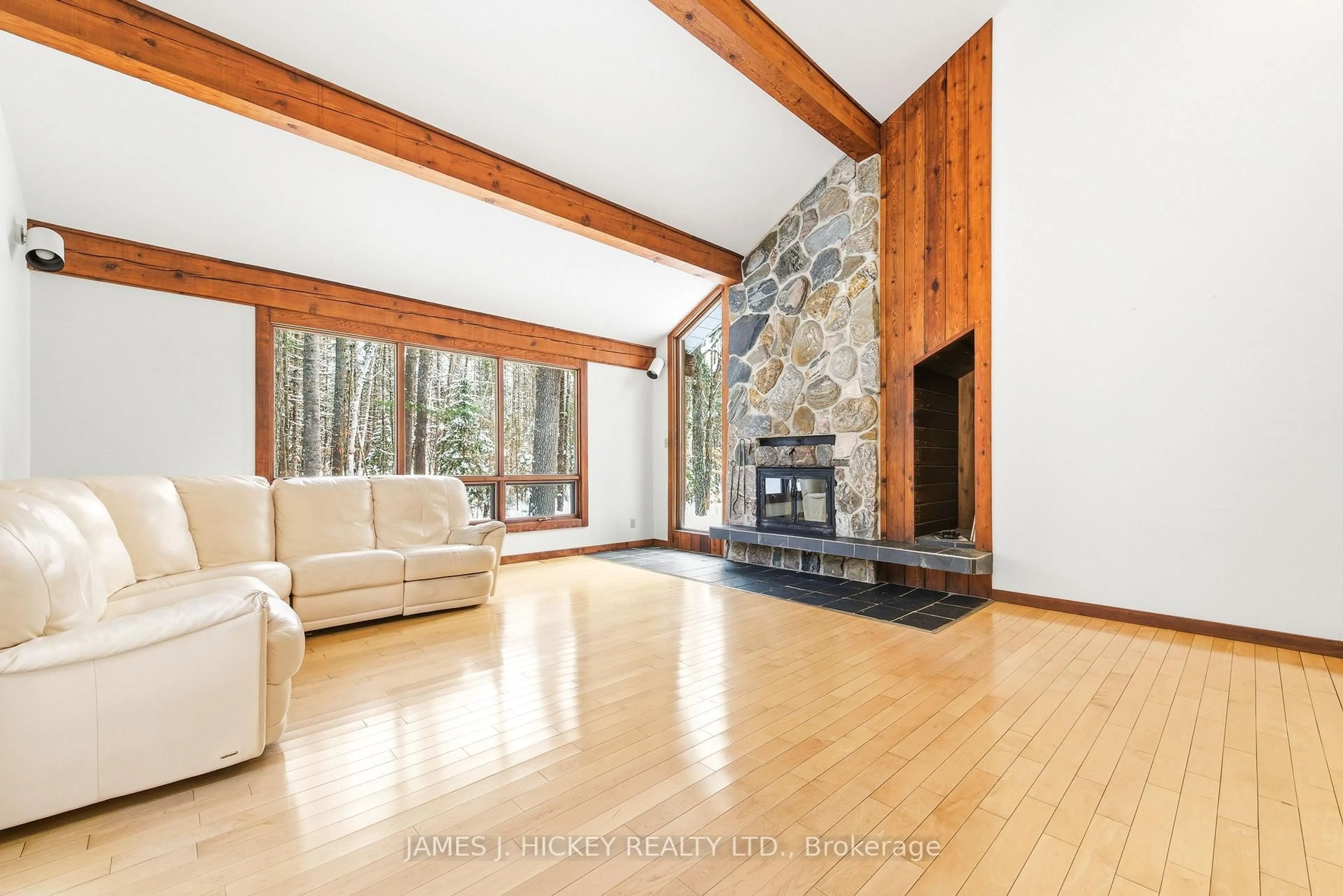 Living room with furniture, wood/laminate floor for 120 Wylie Rd, Deep River Ontario K0J 1P0