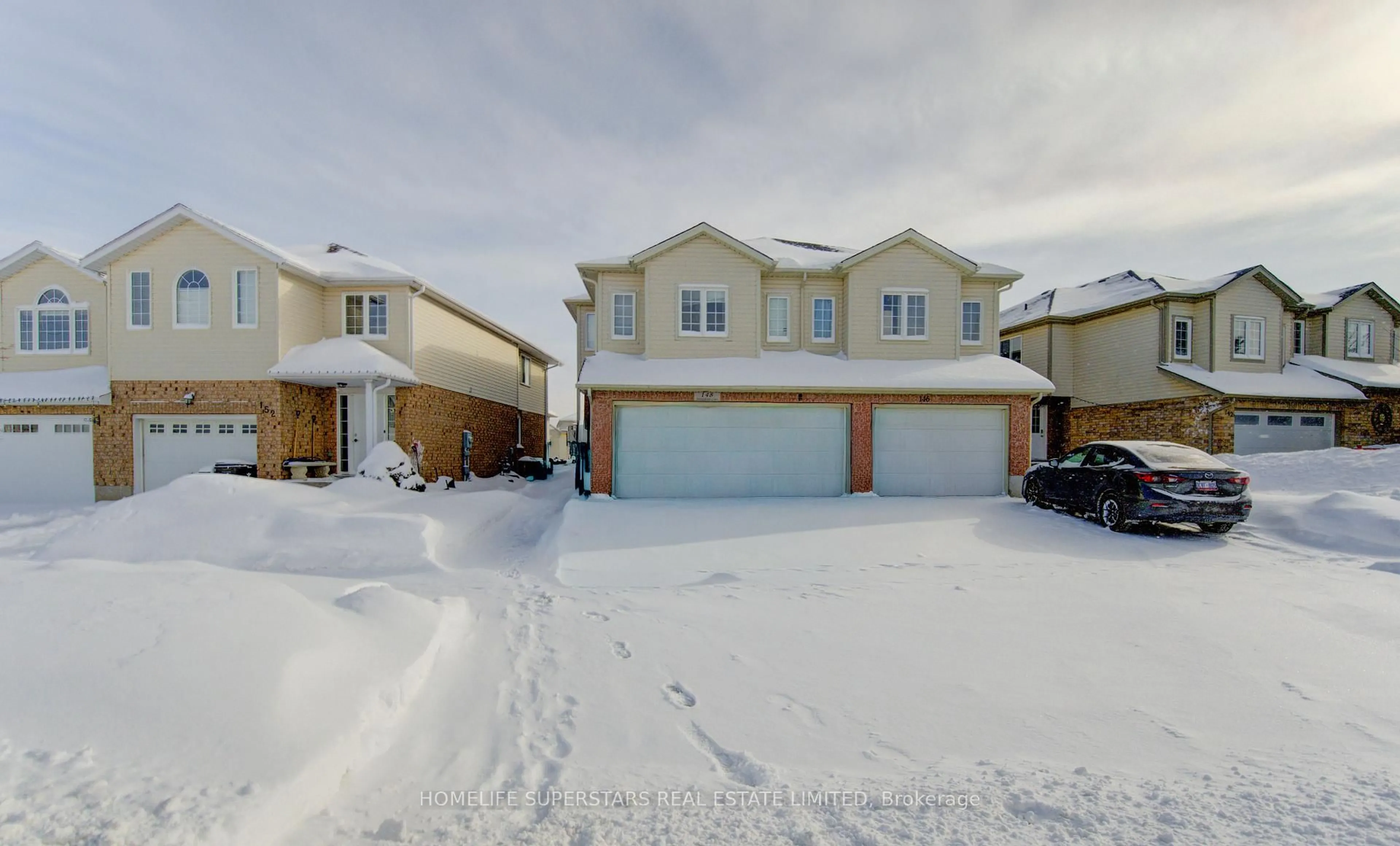 A pic from outside/outdoor area/front of a property/back of a property/a pic from drone, street for 148 Snowdrop Cres, Kitchener Ontario N2E 4G7