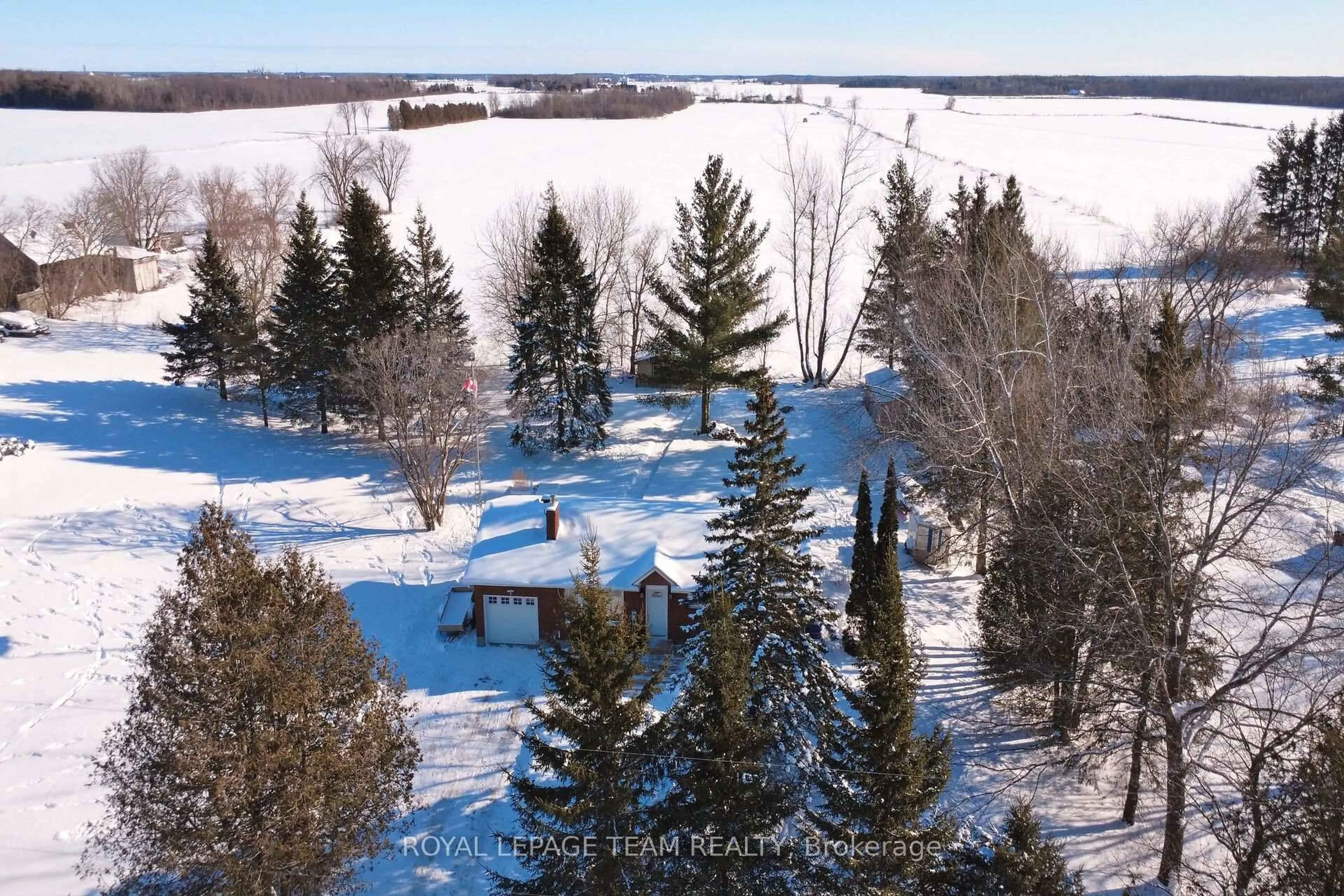 A pic from outside/outdoor area/front of a property/back of a property/a pic from drone, forest/trees view for 2968 Harbison Rd, Richmond Ontario K0A 2Z0
