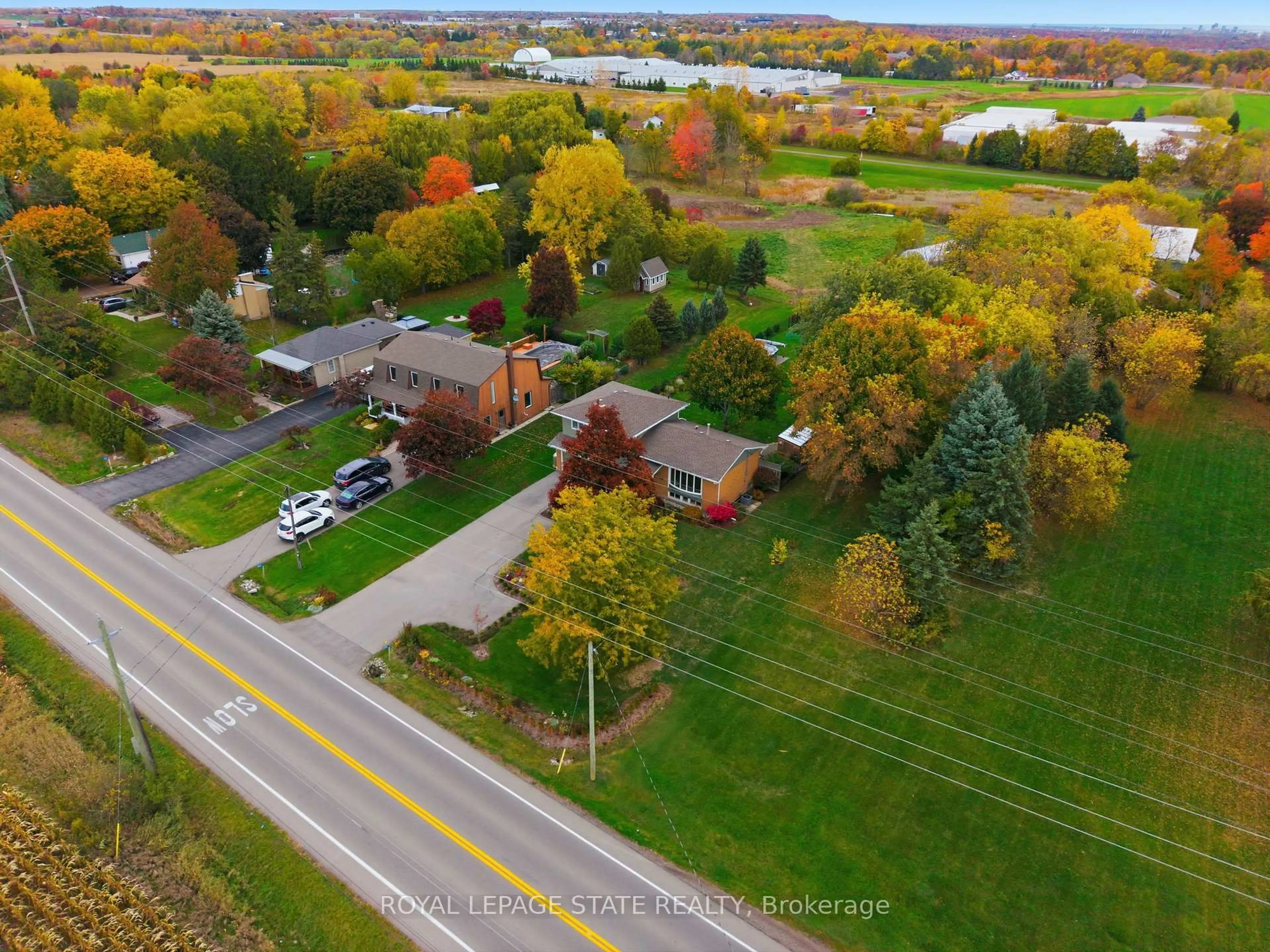 A pic from outside/outdoor area/front of a property/back of a property/a pic from drone, street for 348 Sydenham Rd, Hamilton Ontario L9H 5E2