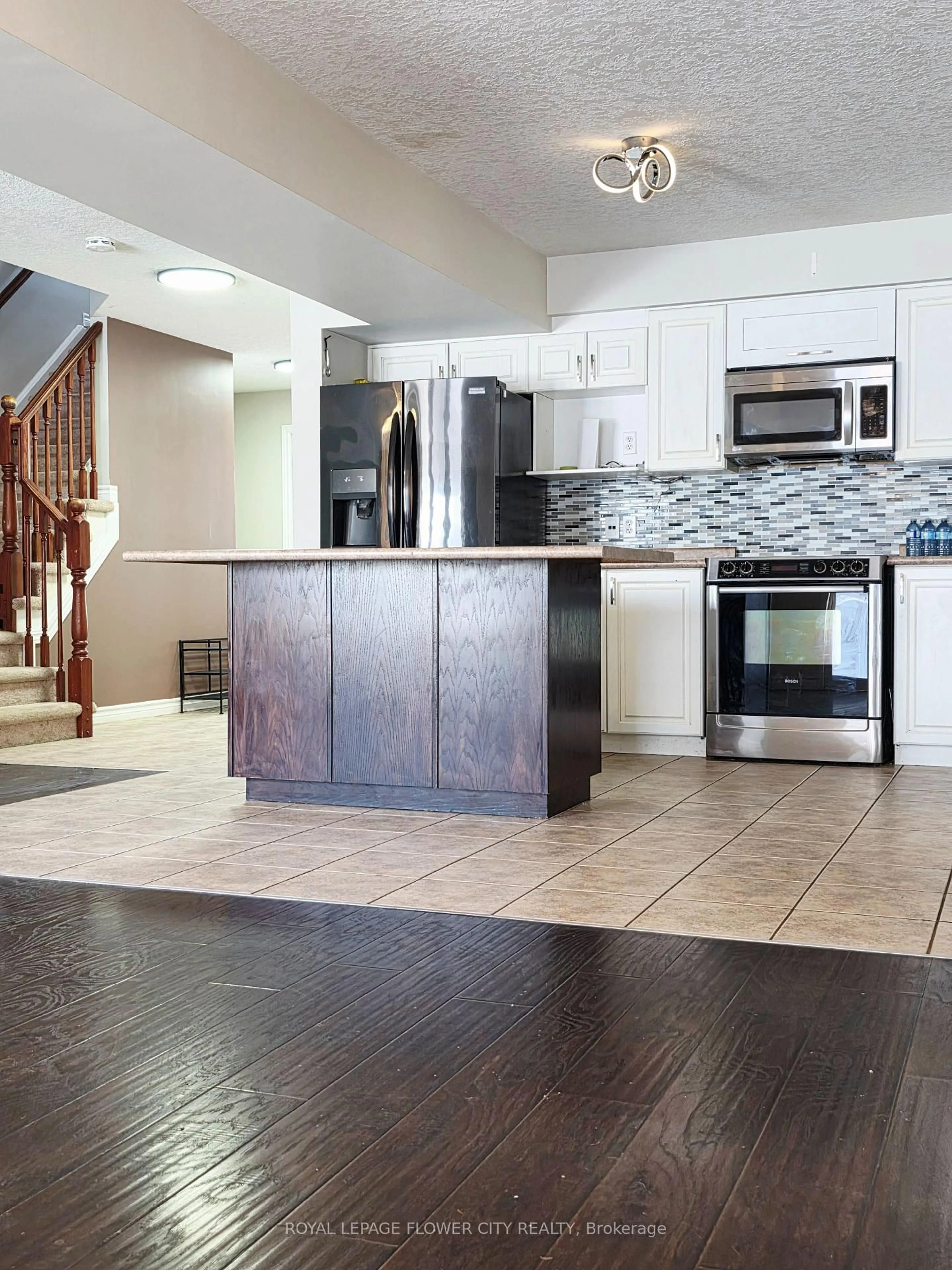 Open concept kitchen, ceramic/tile floor for 187 Huck Cres, Kitchener Ontario N2N 3P7