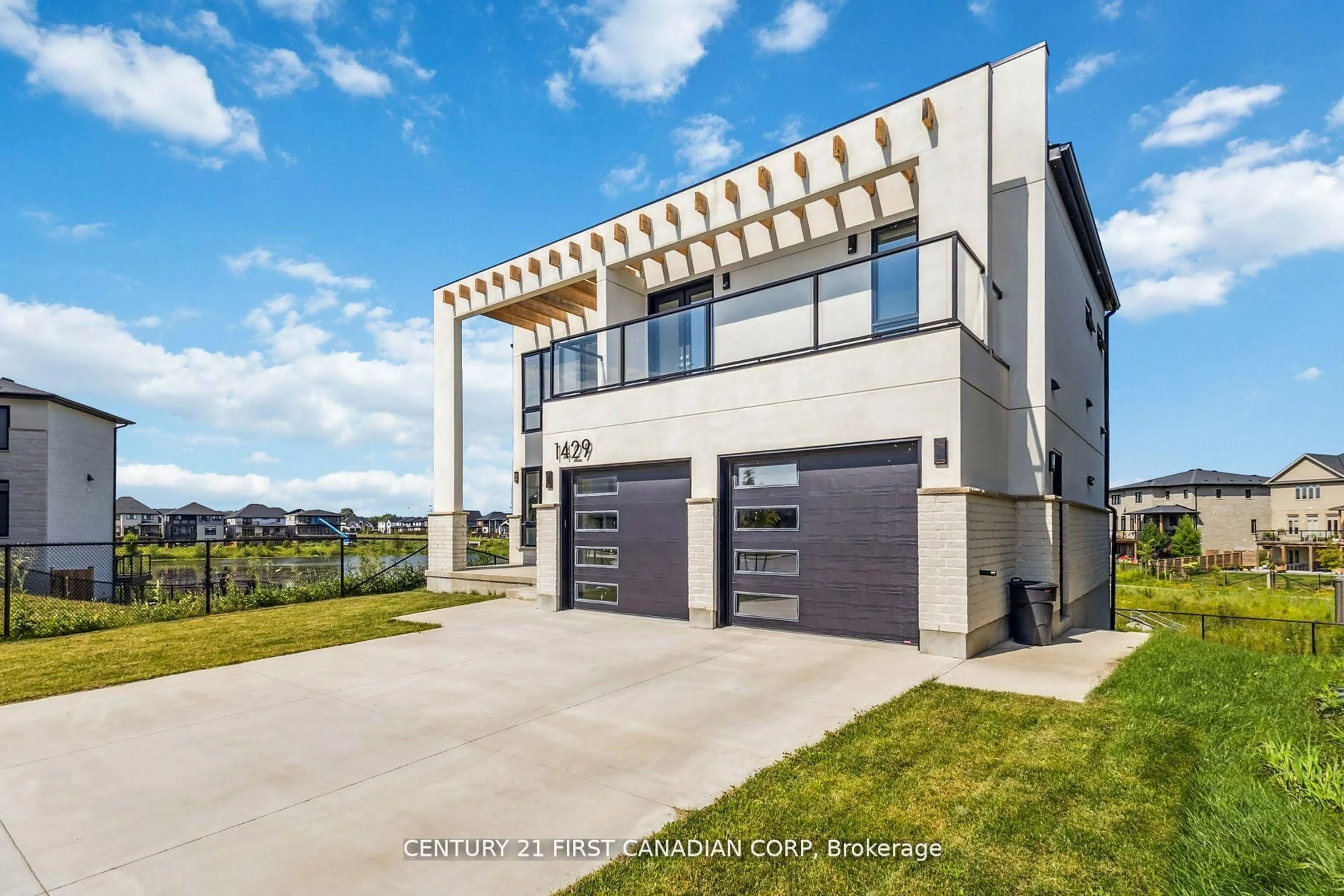 Home with brick exterior material, street for 1429 MEDWAY PARK Dr, London North Ontario N6G 0Z6