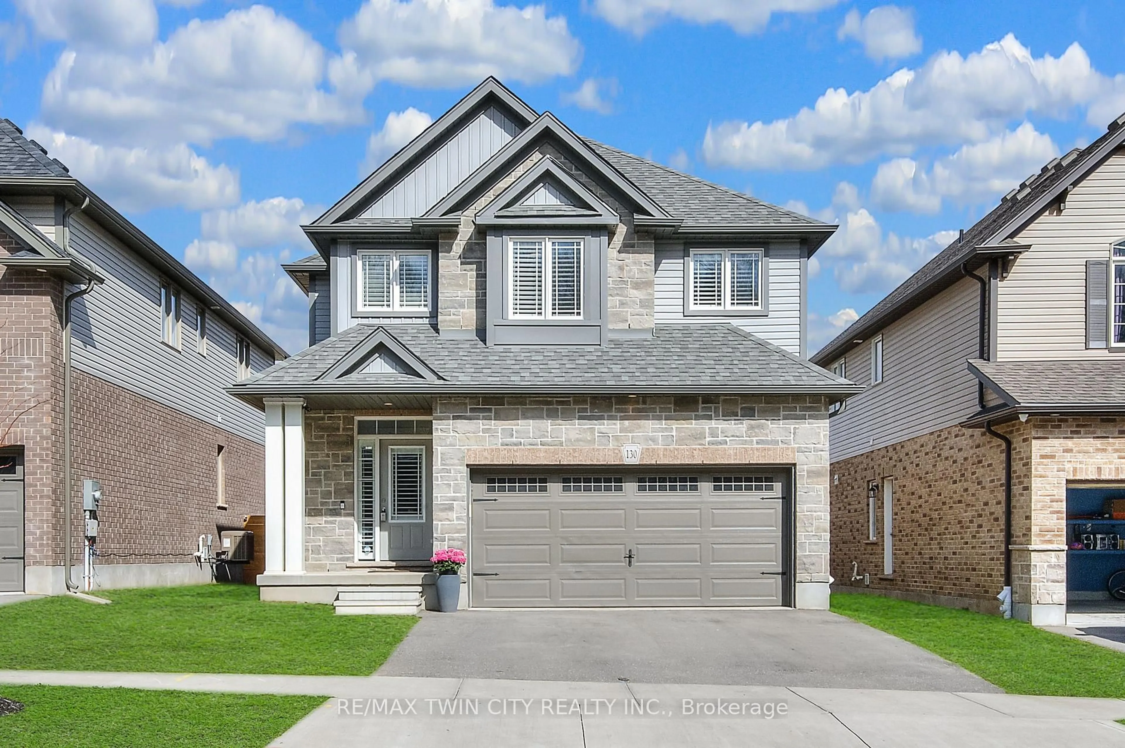Home with brick exterior material, street for 130 Elmbank Tr, Kitchener Ontario N2R 0H2